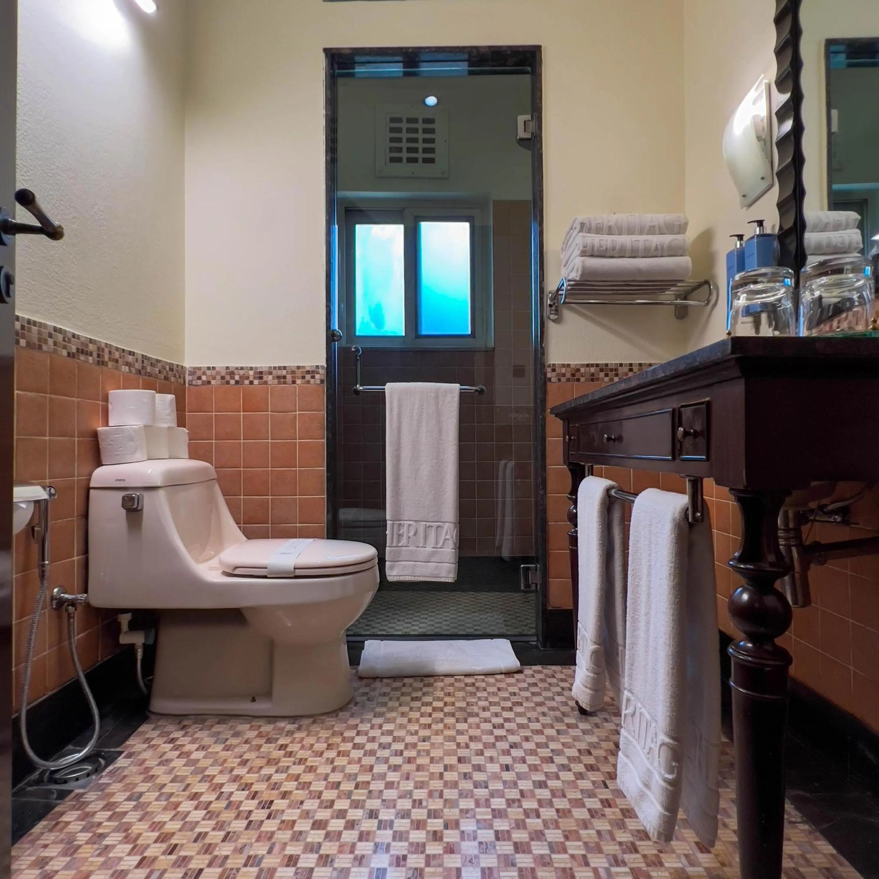 Toilet in Heritage Luxury Suites All Suite Hotel