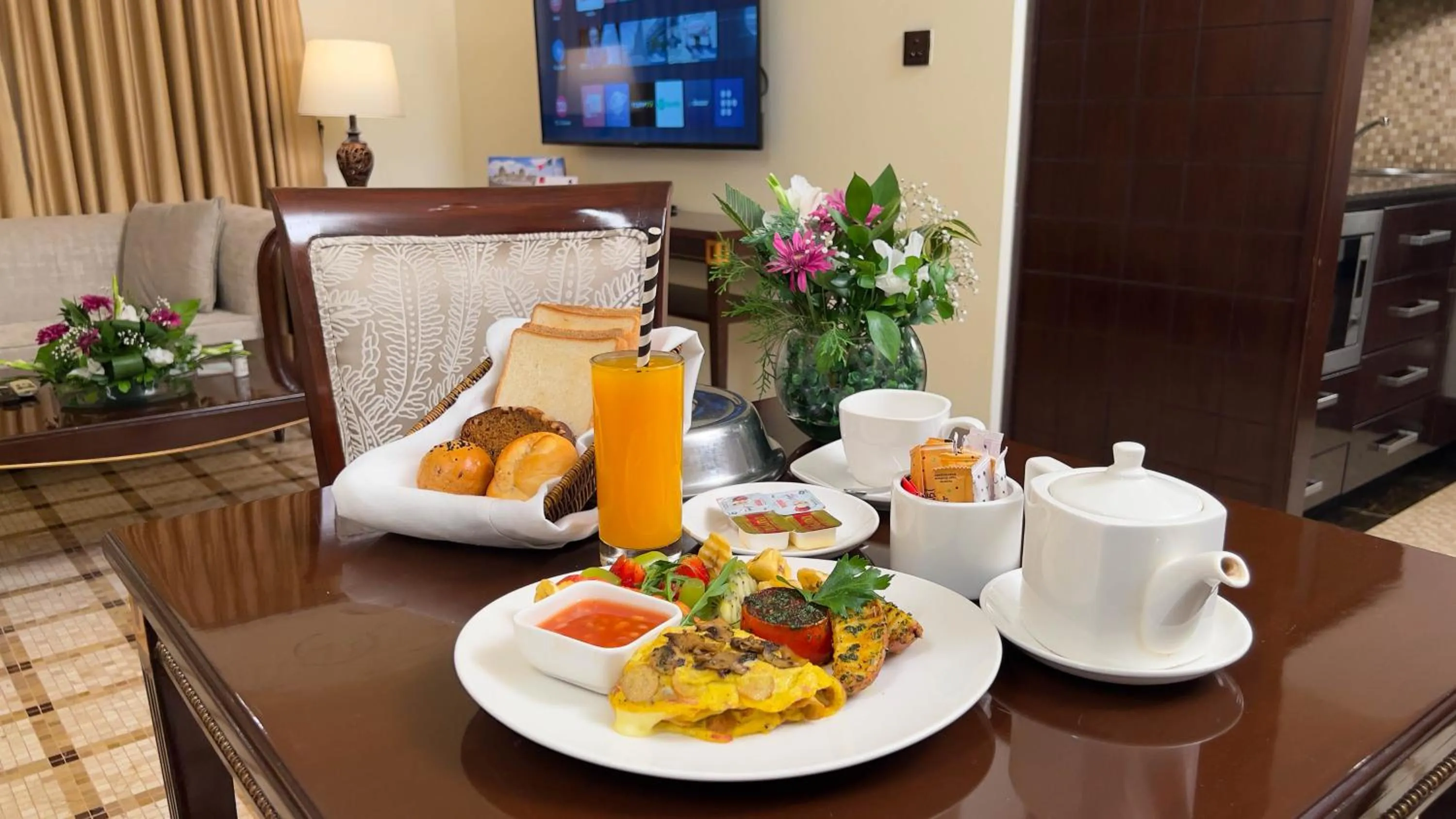 TV and multimedia in Heritage Luxury Suites All Suite Hotel