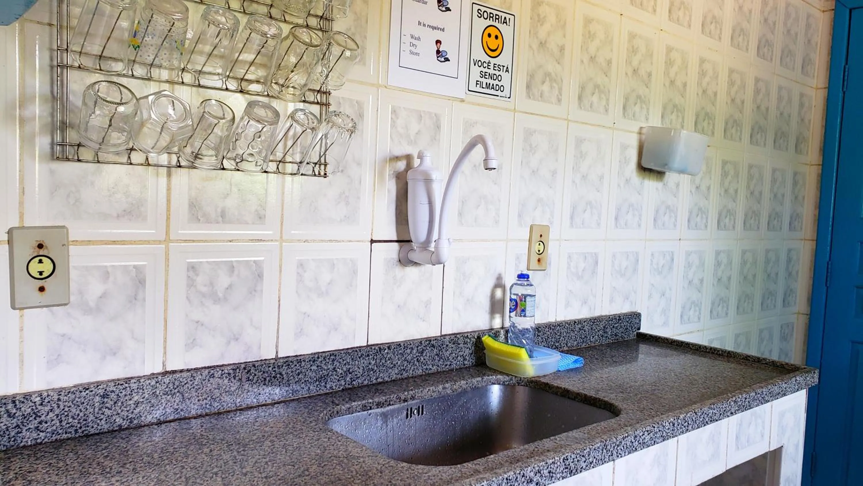 Kitchen or kitchenette in Raio de Sol pousada & camping