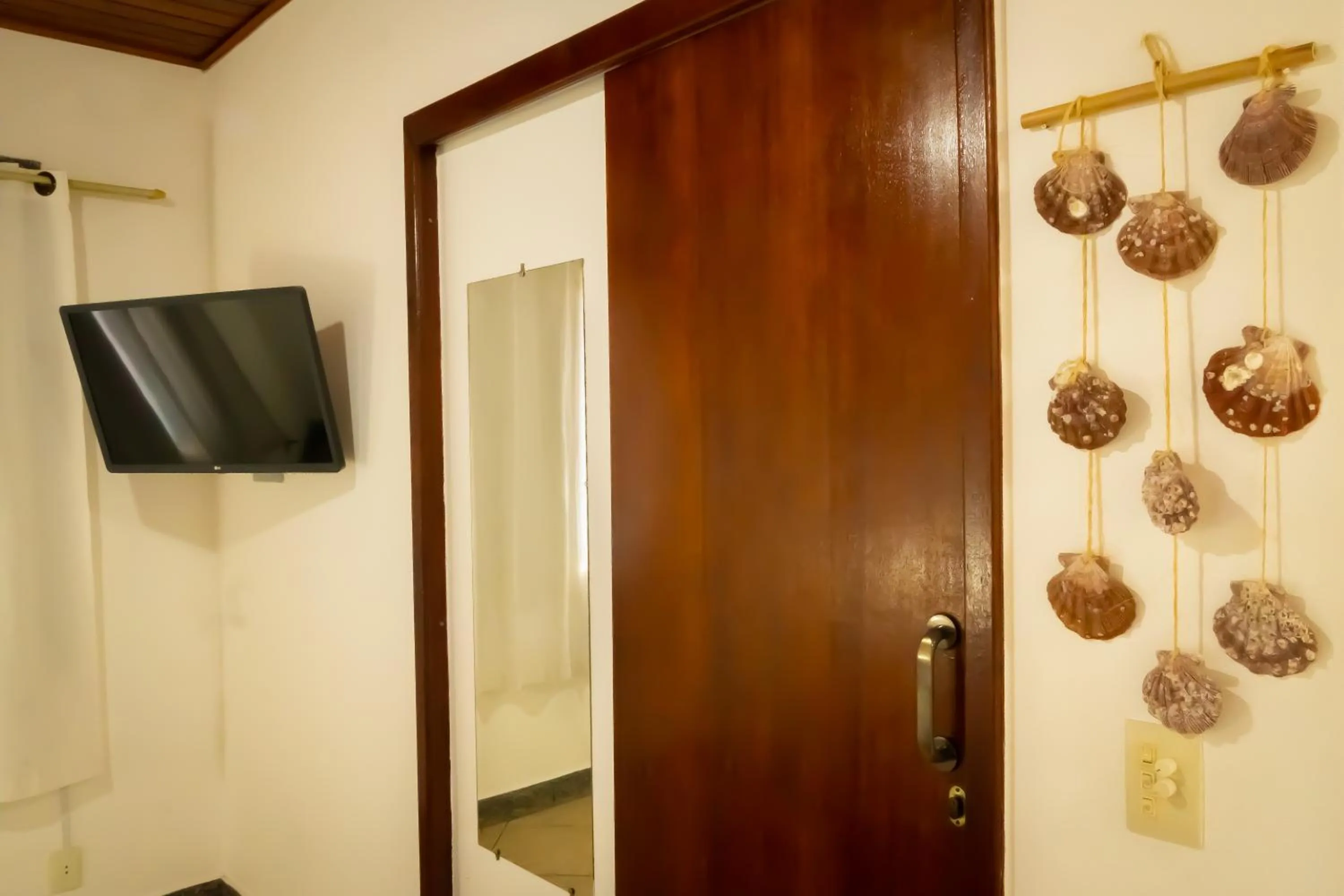 TV and multimedia in Raio de Sol pousada & camping