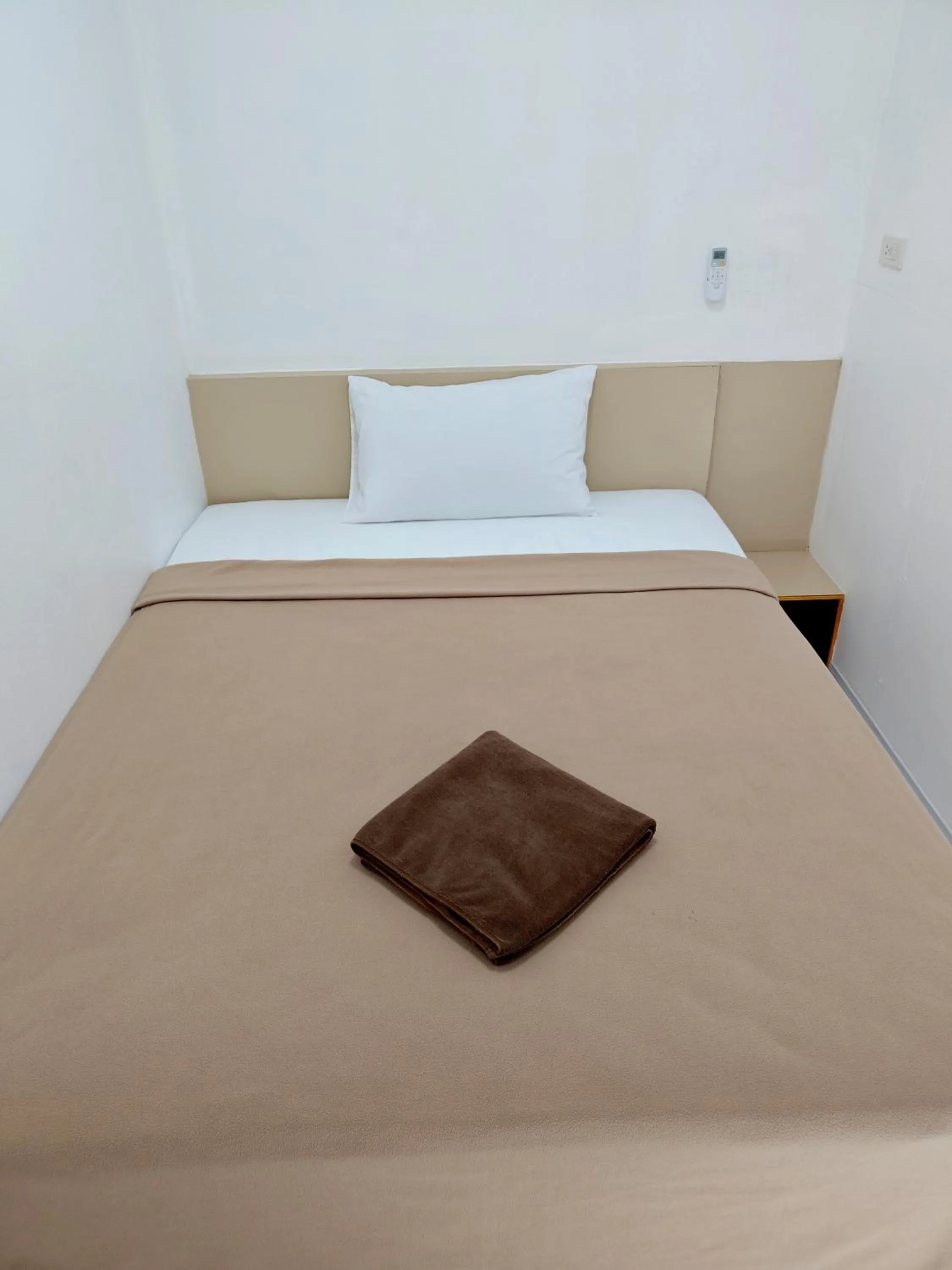 Bed in Aladdin Guest House