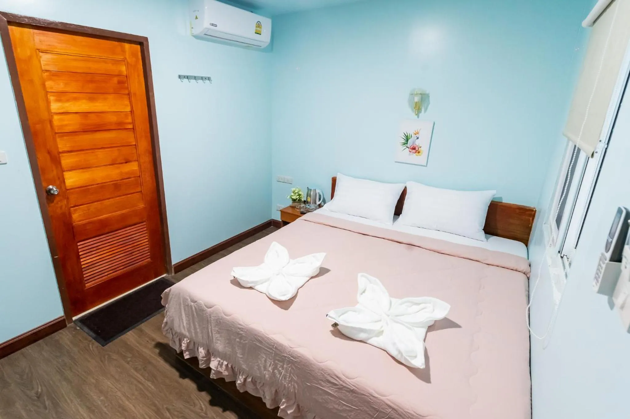 Bed in Aladdin Guest House