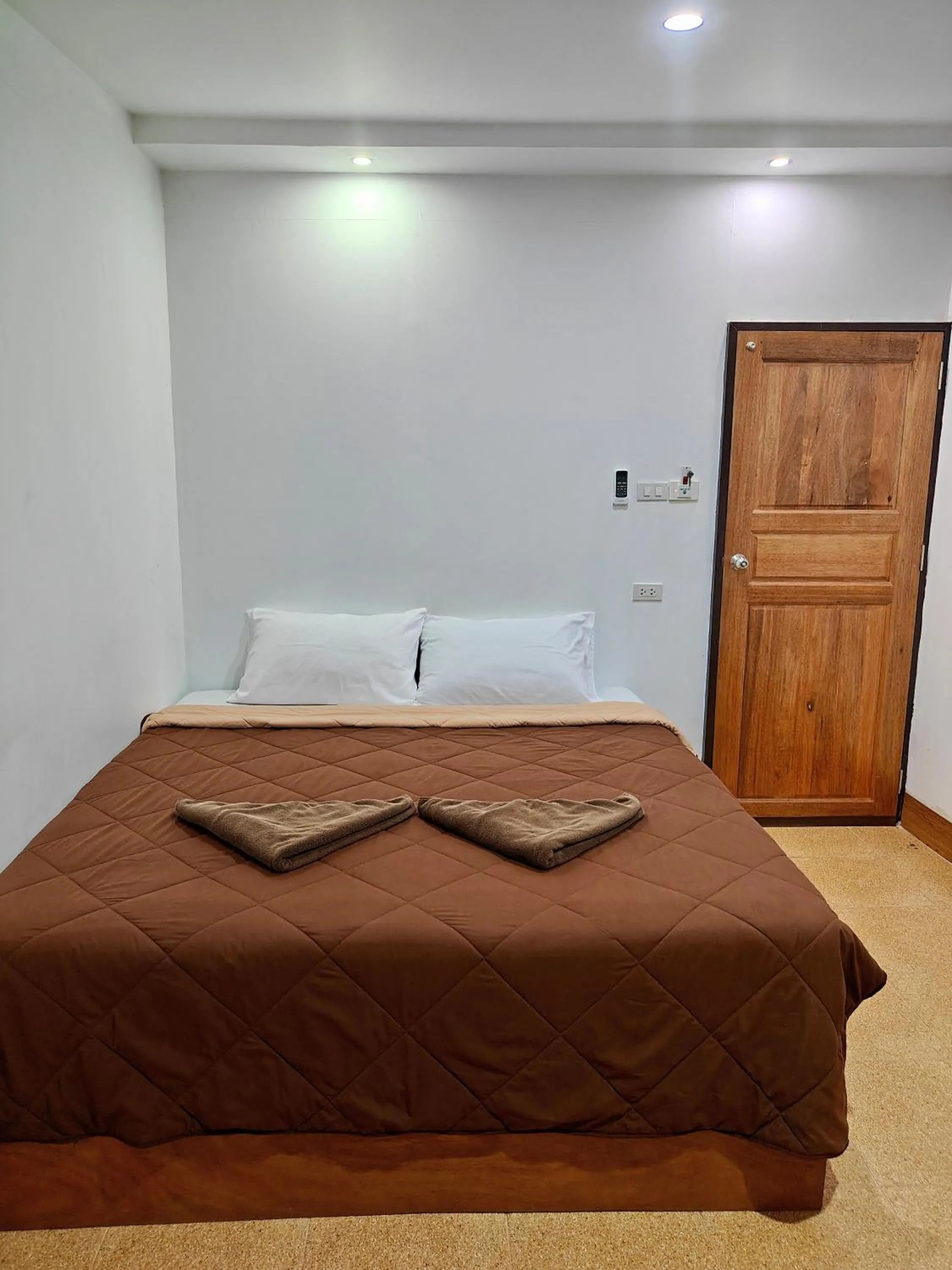 Bed in Aladdin Guest House