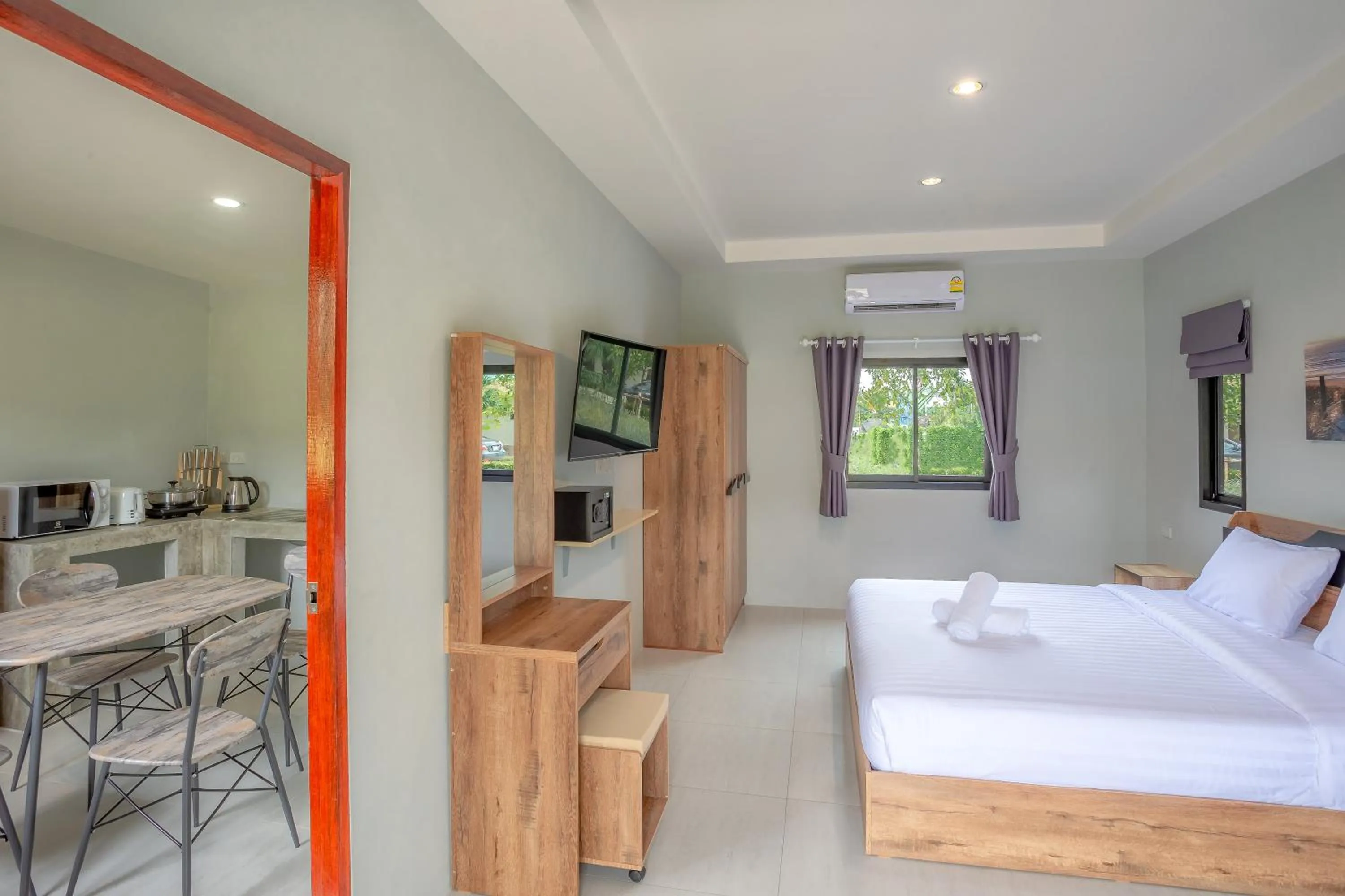 Kitchen or kitchenette, Bed in Malinee Resort