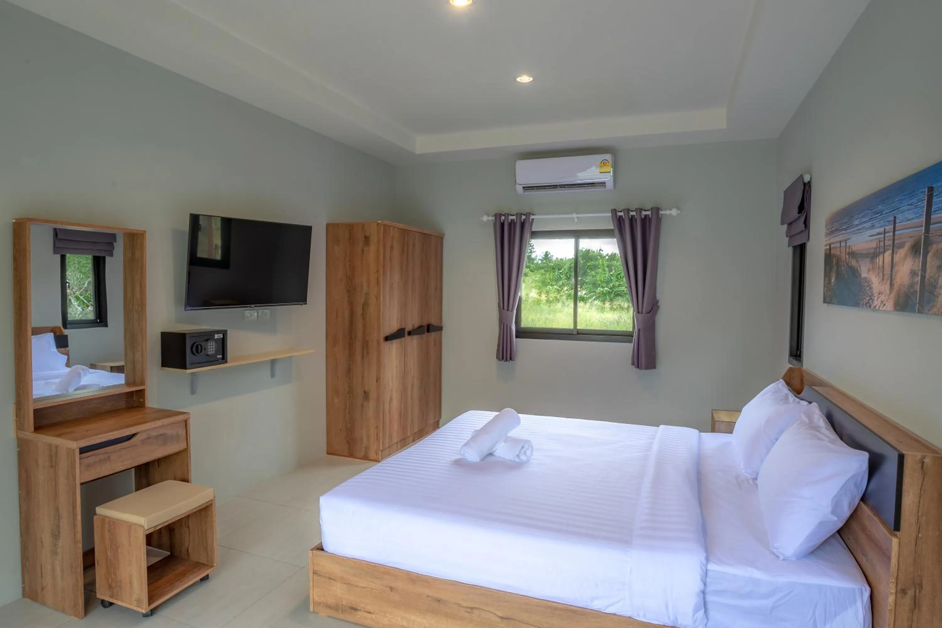 Bed in Malinee Resort