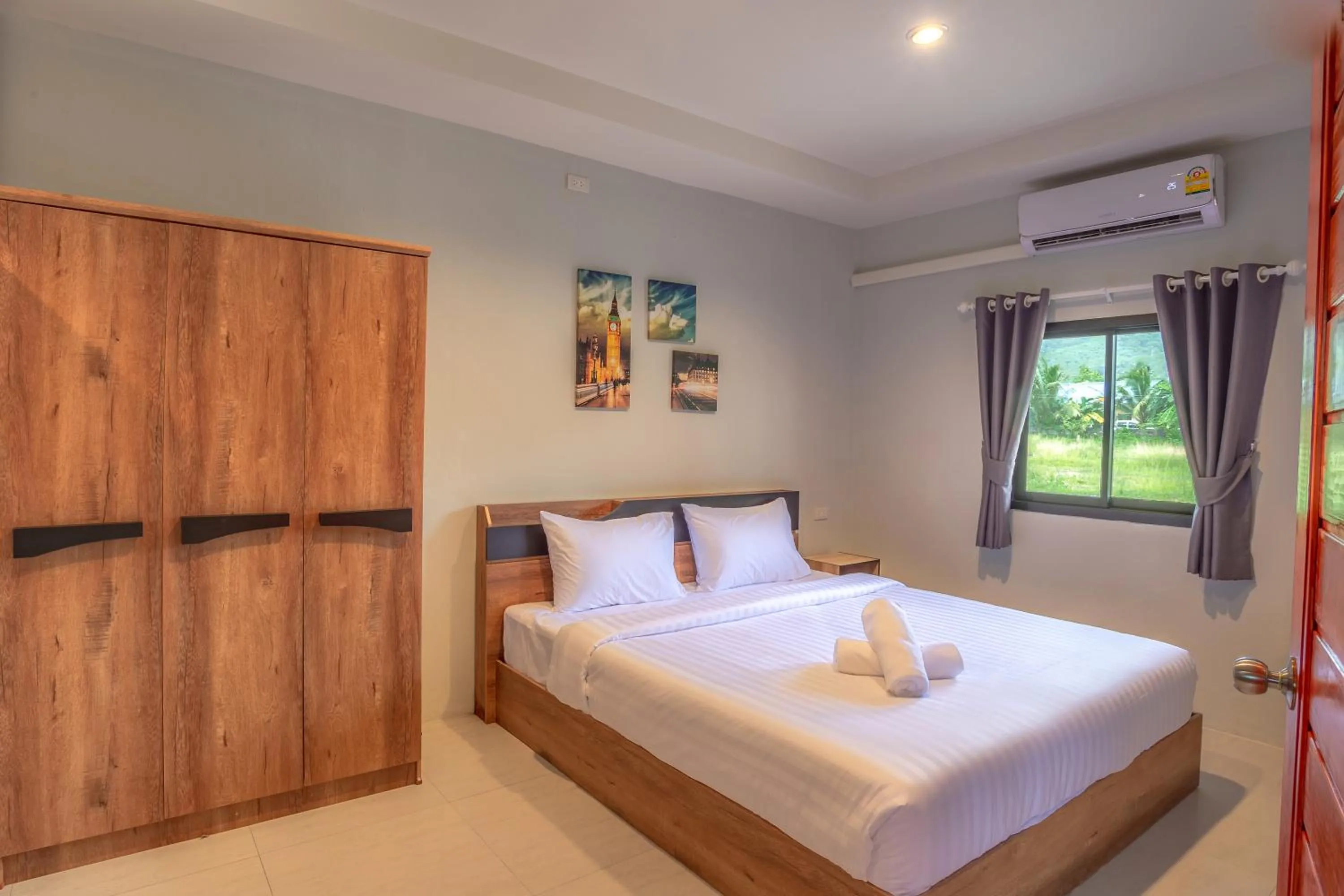 Bed in Malinee Resort