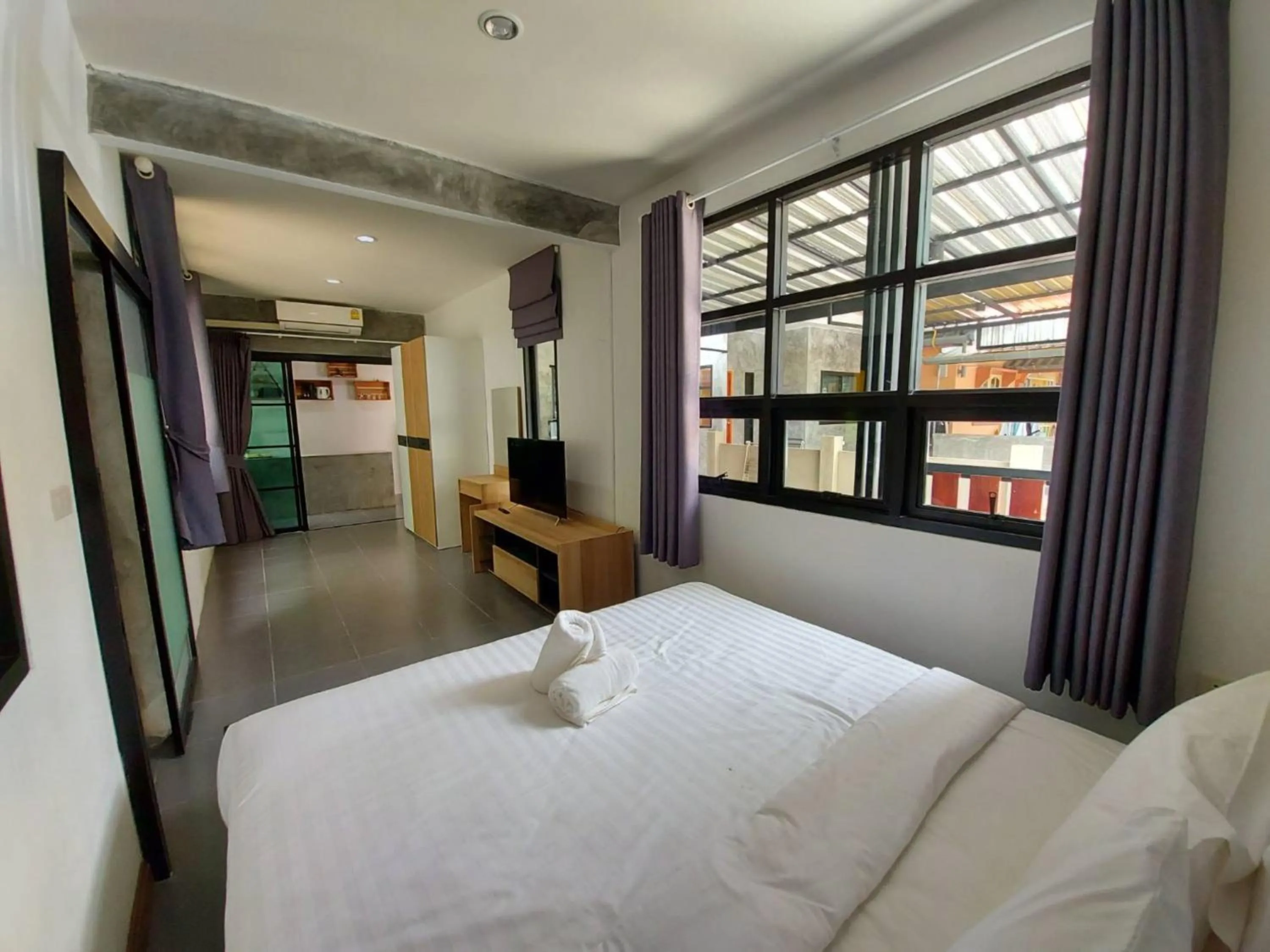 Bed in Malinee Resort