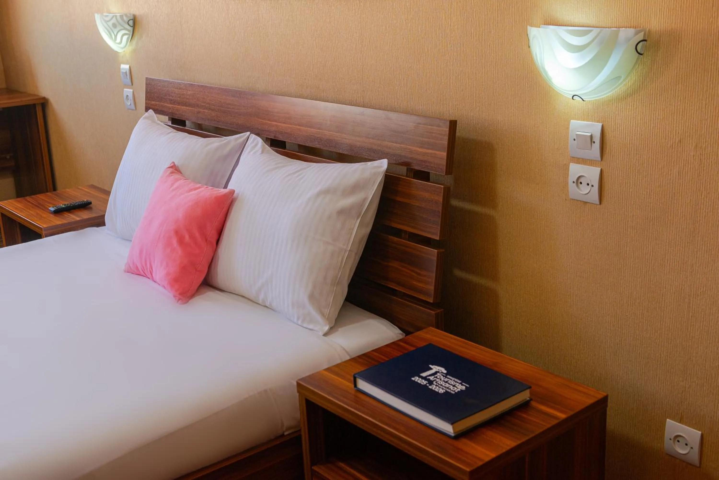 Bed in Hotel Le Pousse Pousse