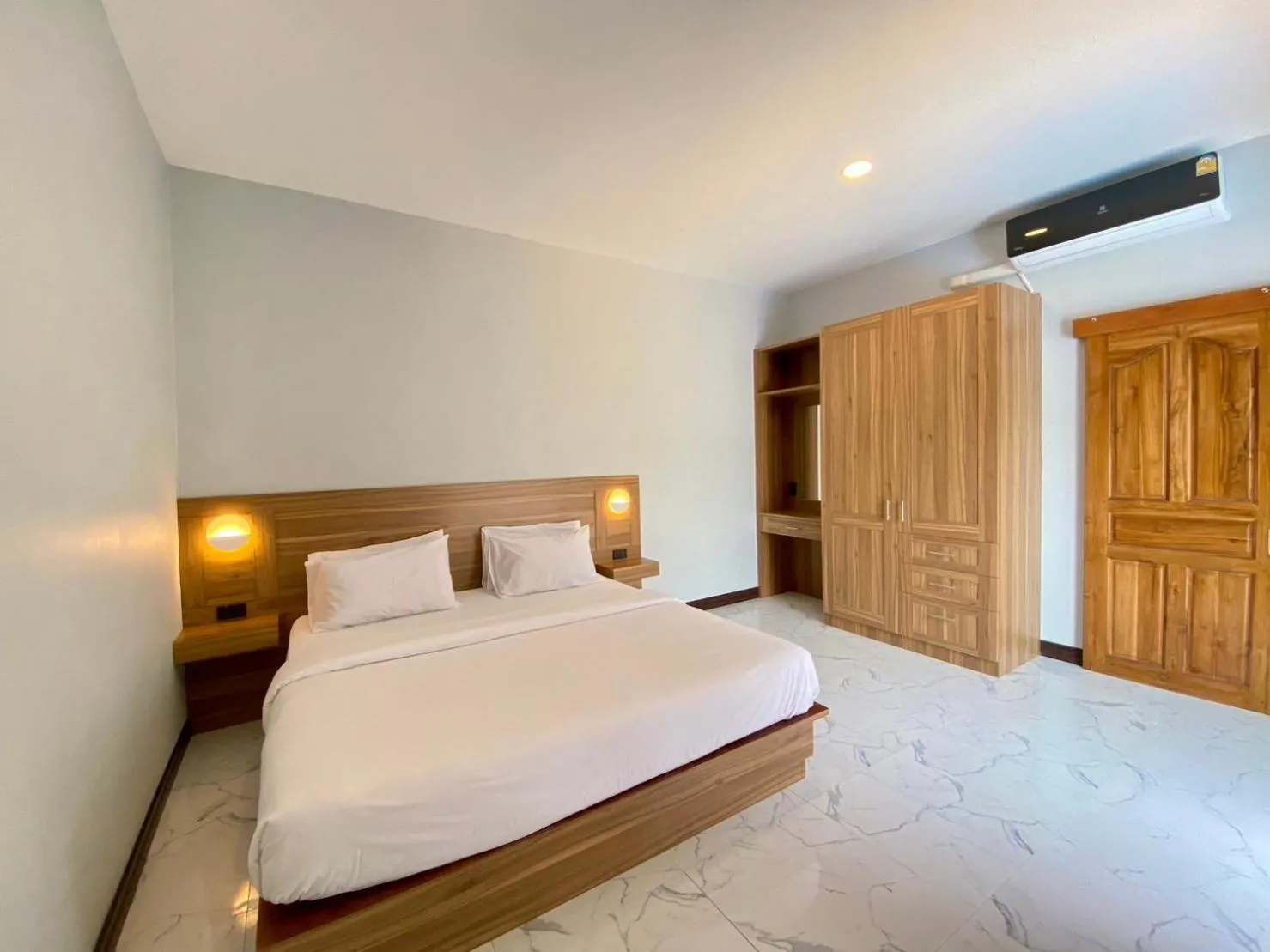 Bed in Blue Aura Pool Villa