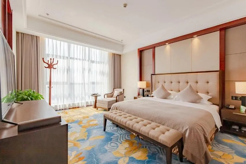 Bed in Binhai Jinling International Hotel