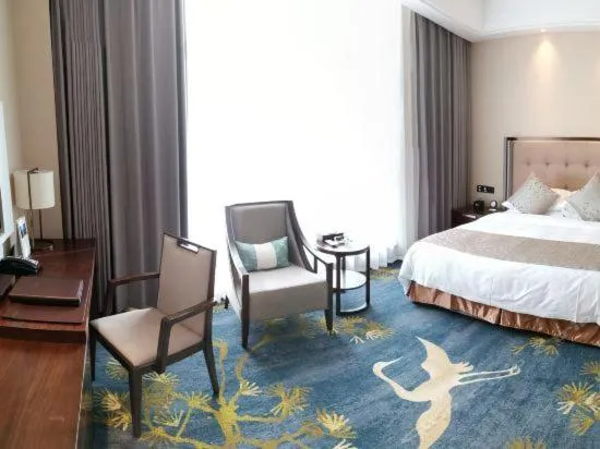 Bed in Binhai Jinling International Hotel