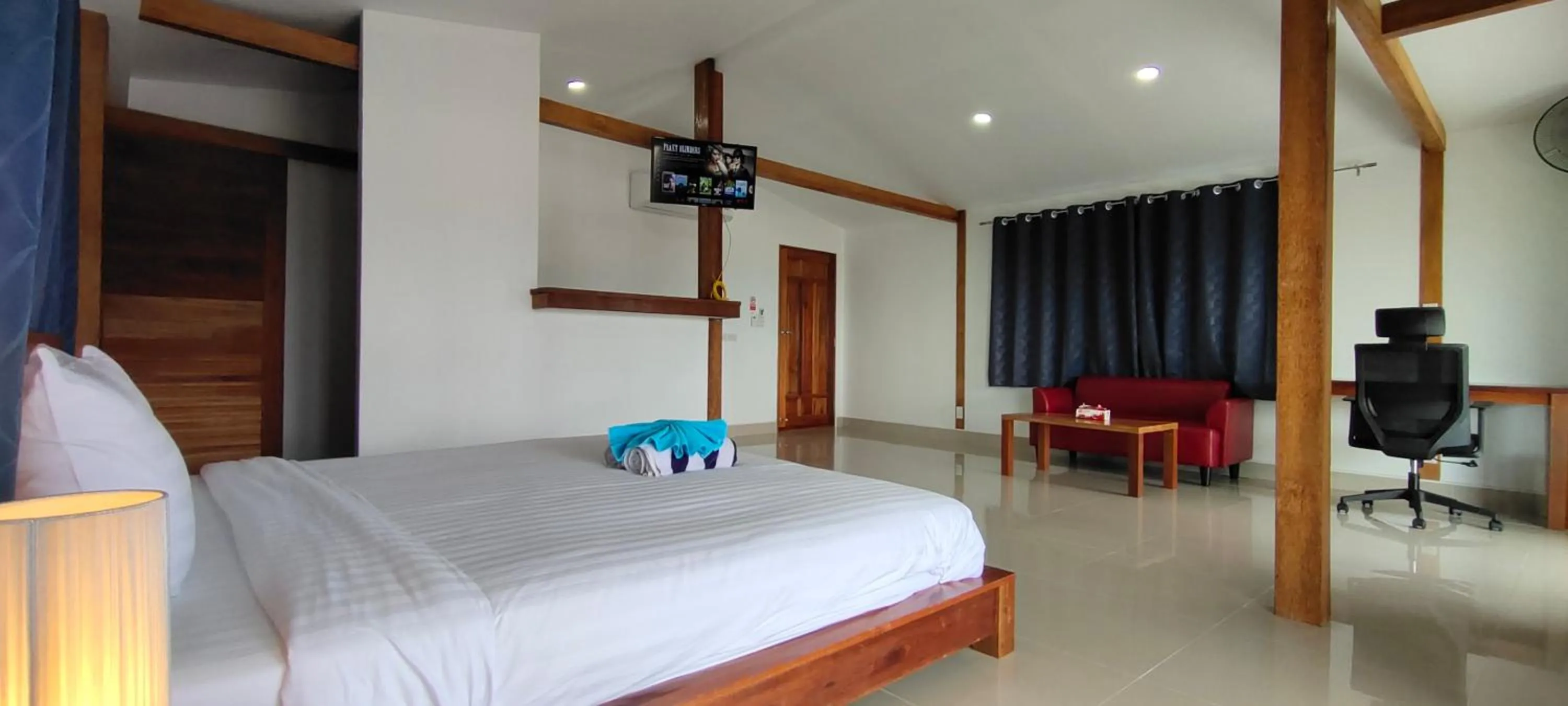 Bed in Le Grand Bleu Hotel