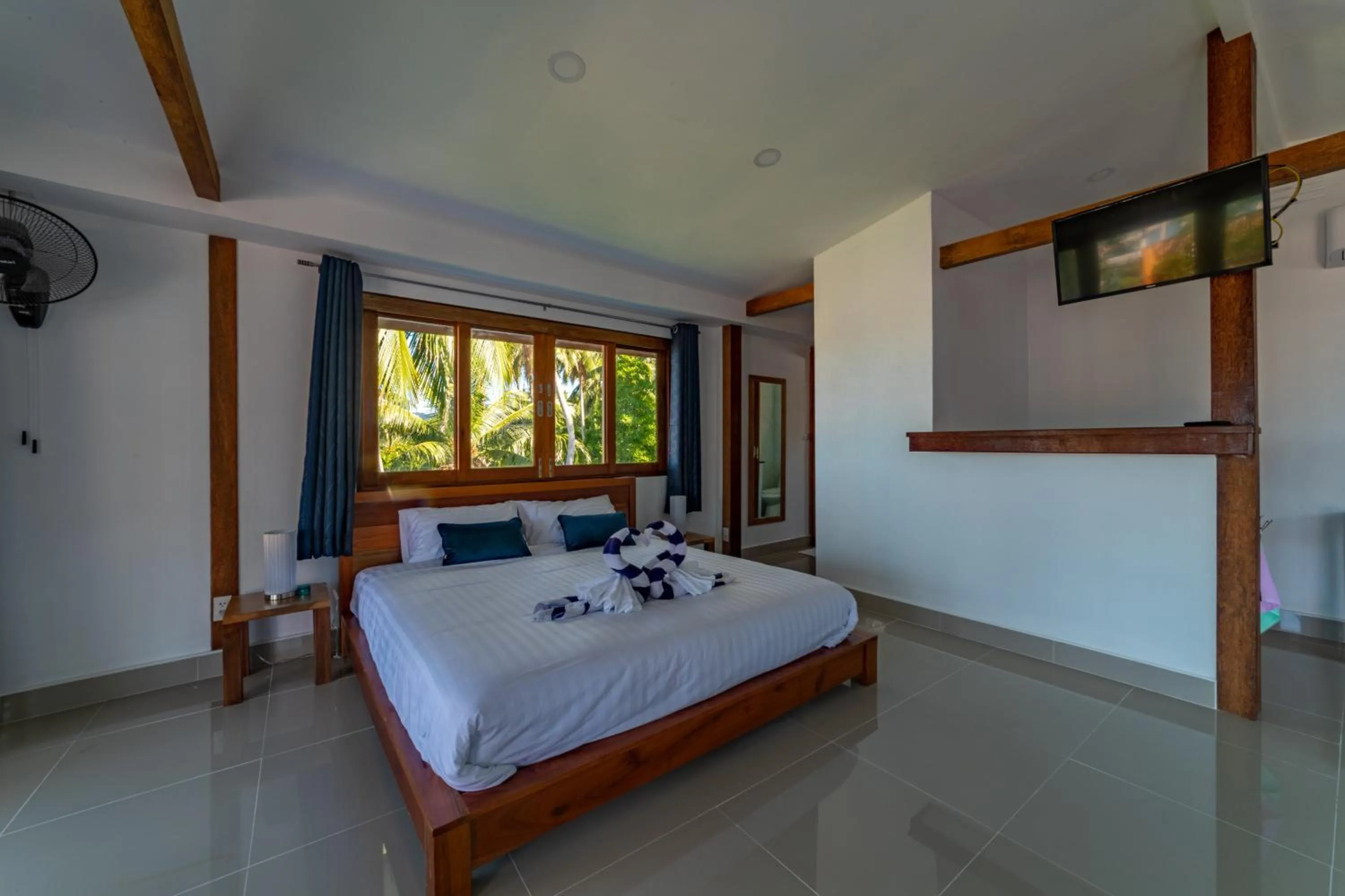 Bed in Le Grand Bleu Hotel