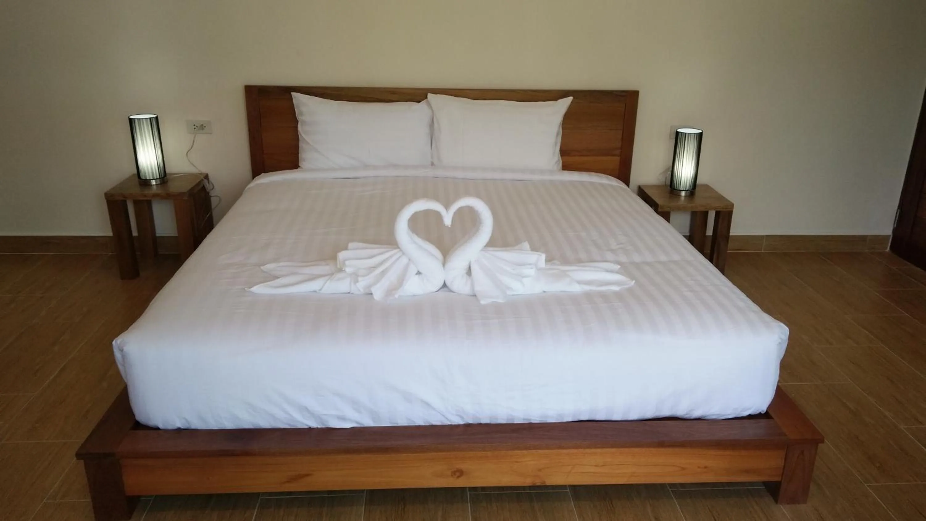 Bed in Le Grand Bleu Hotel