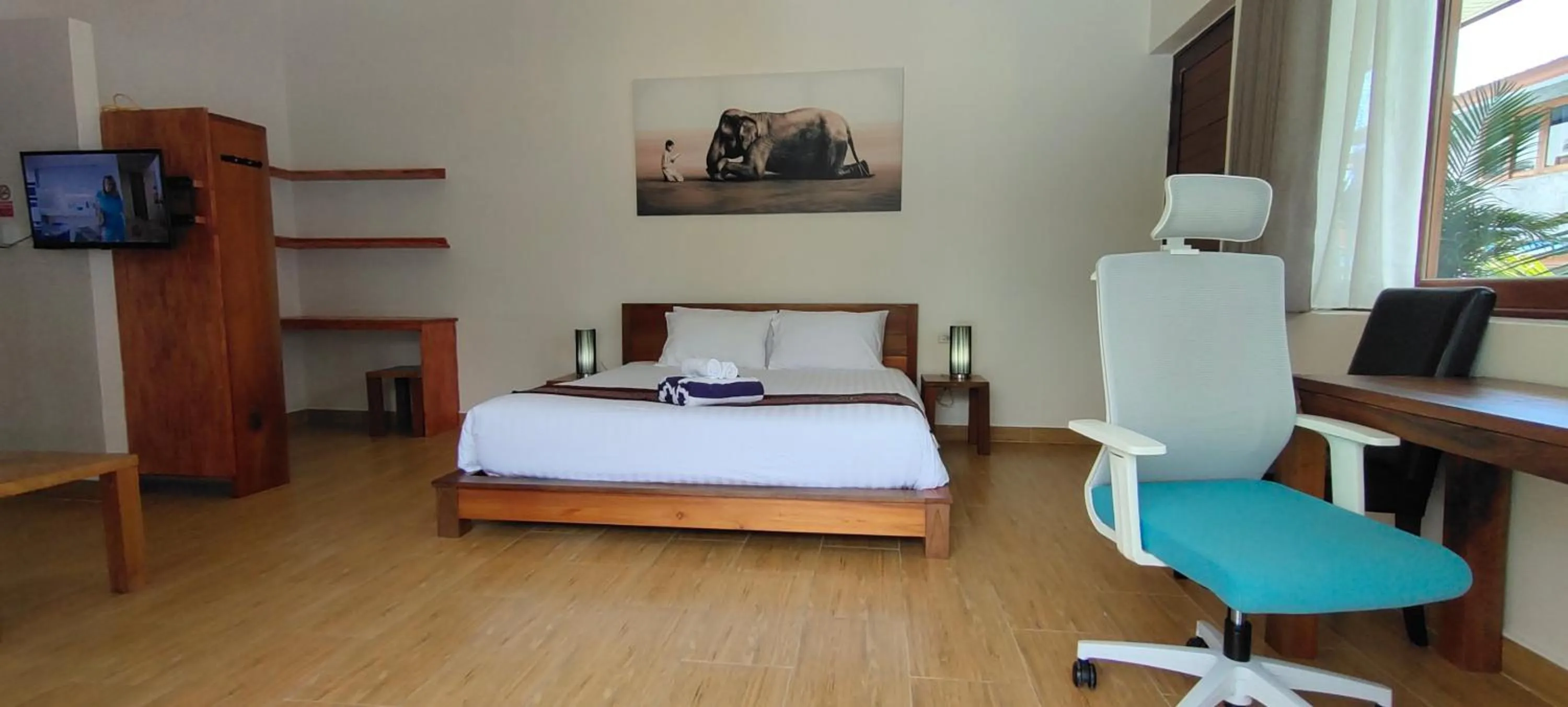 Bed in Le Grand Bleu Hotel