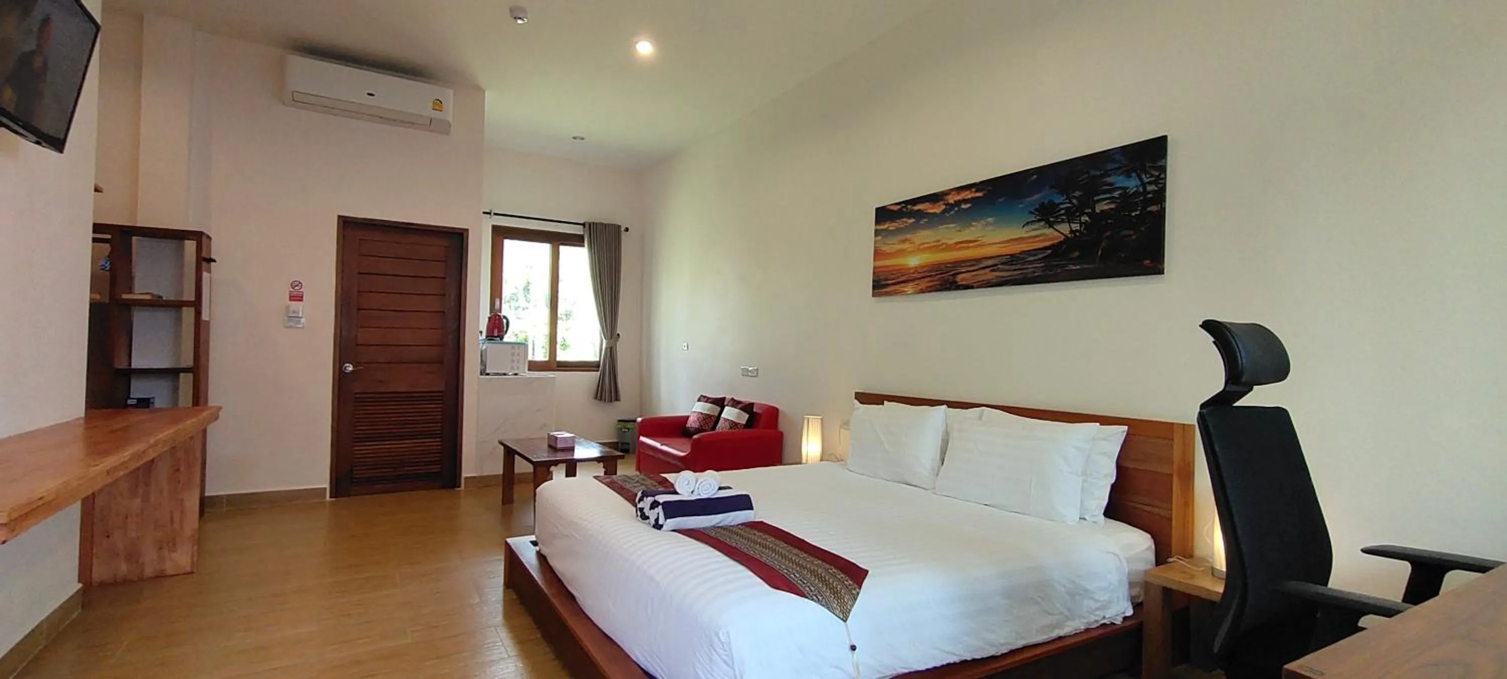 Bed in Le Grand Bleu Hotel