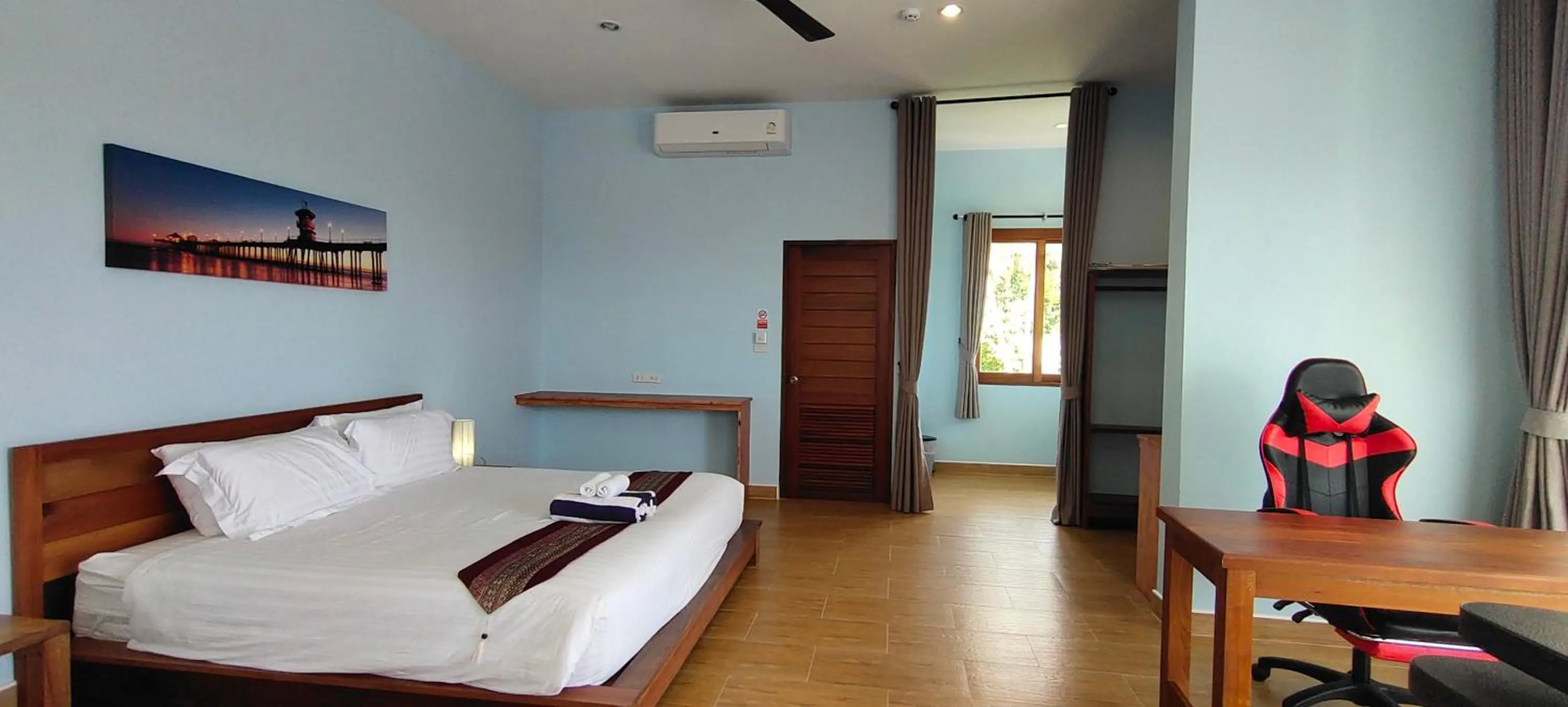 Bed in Le Grand Bleu Hotel