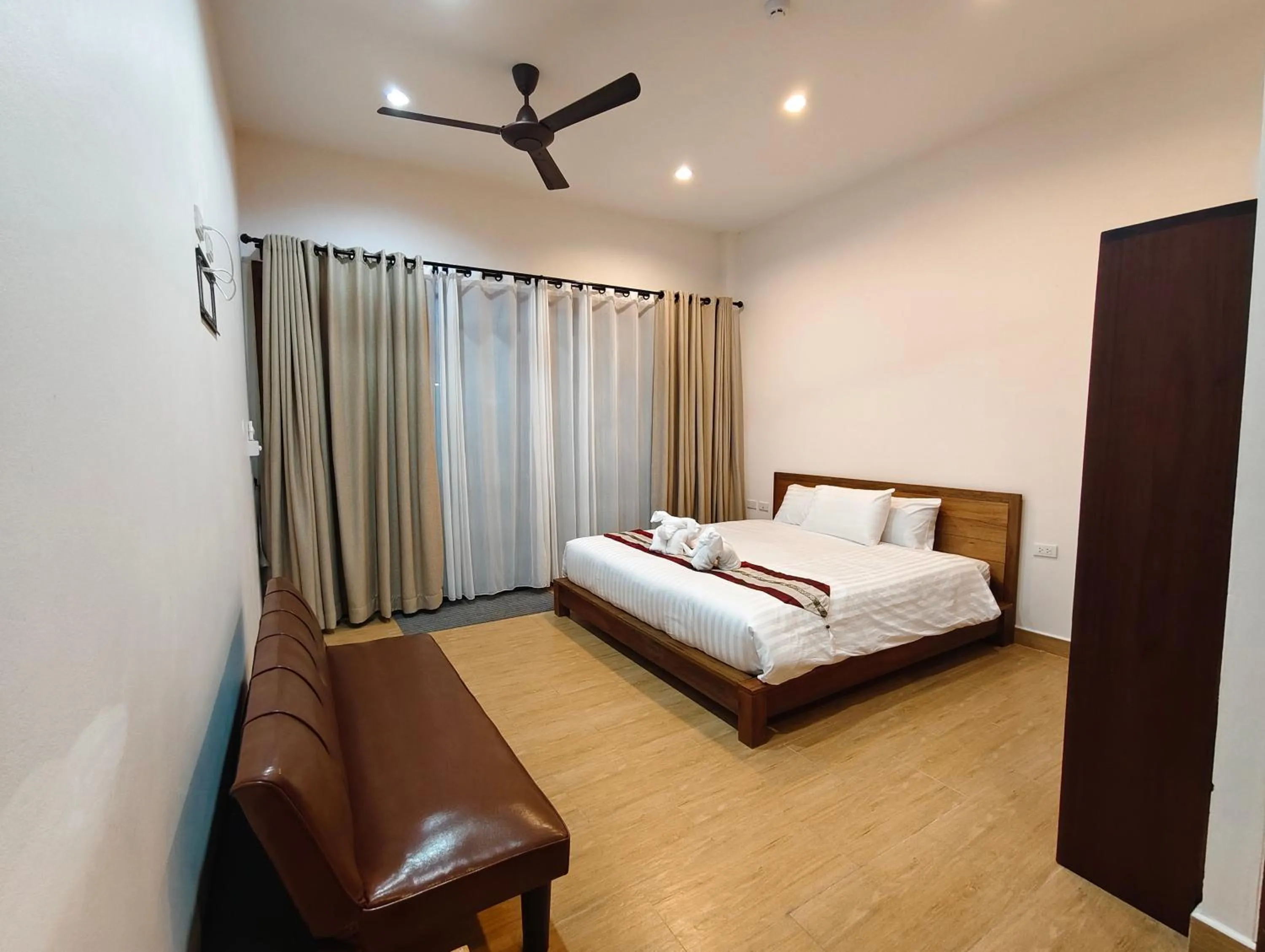 Bed in Le Grand Bleu Hotel