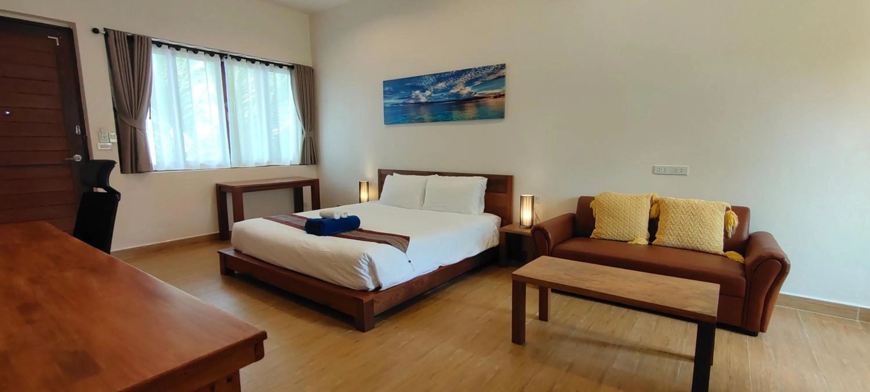 Bed in Le Grand Bleu Hotel