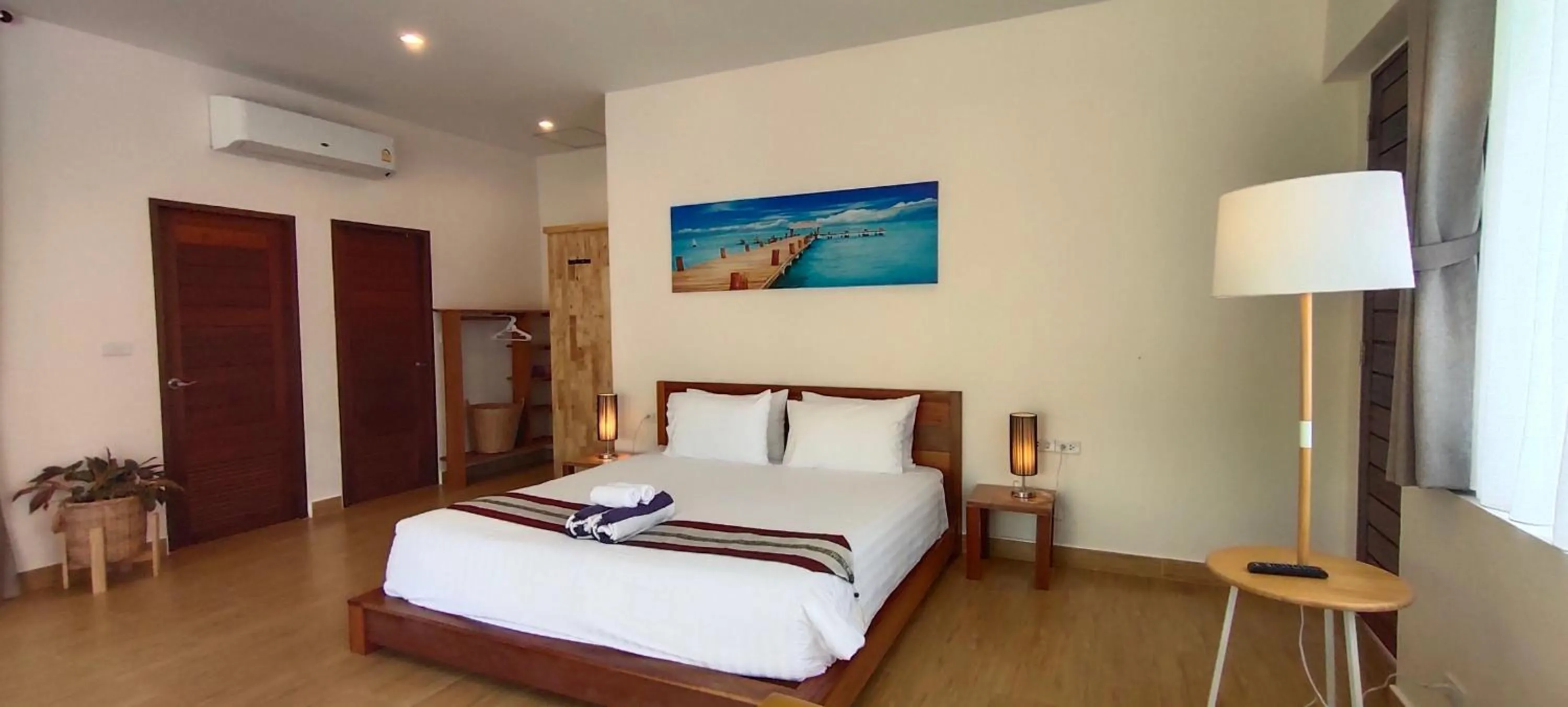 Bed in Le Grand Bleu Hotel