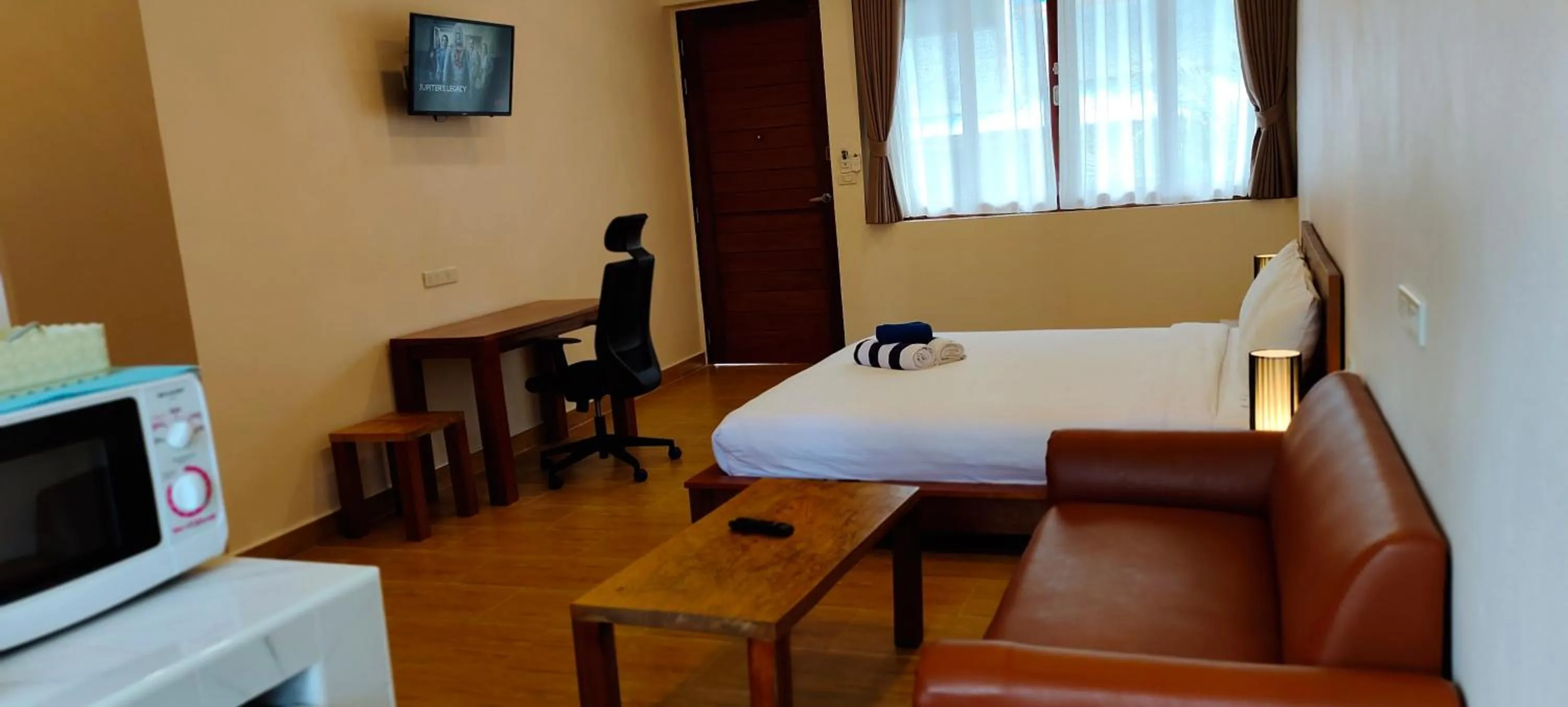 Bed in Le Grand Bleu Hotel