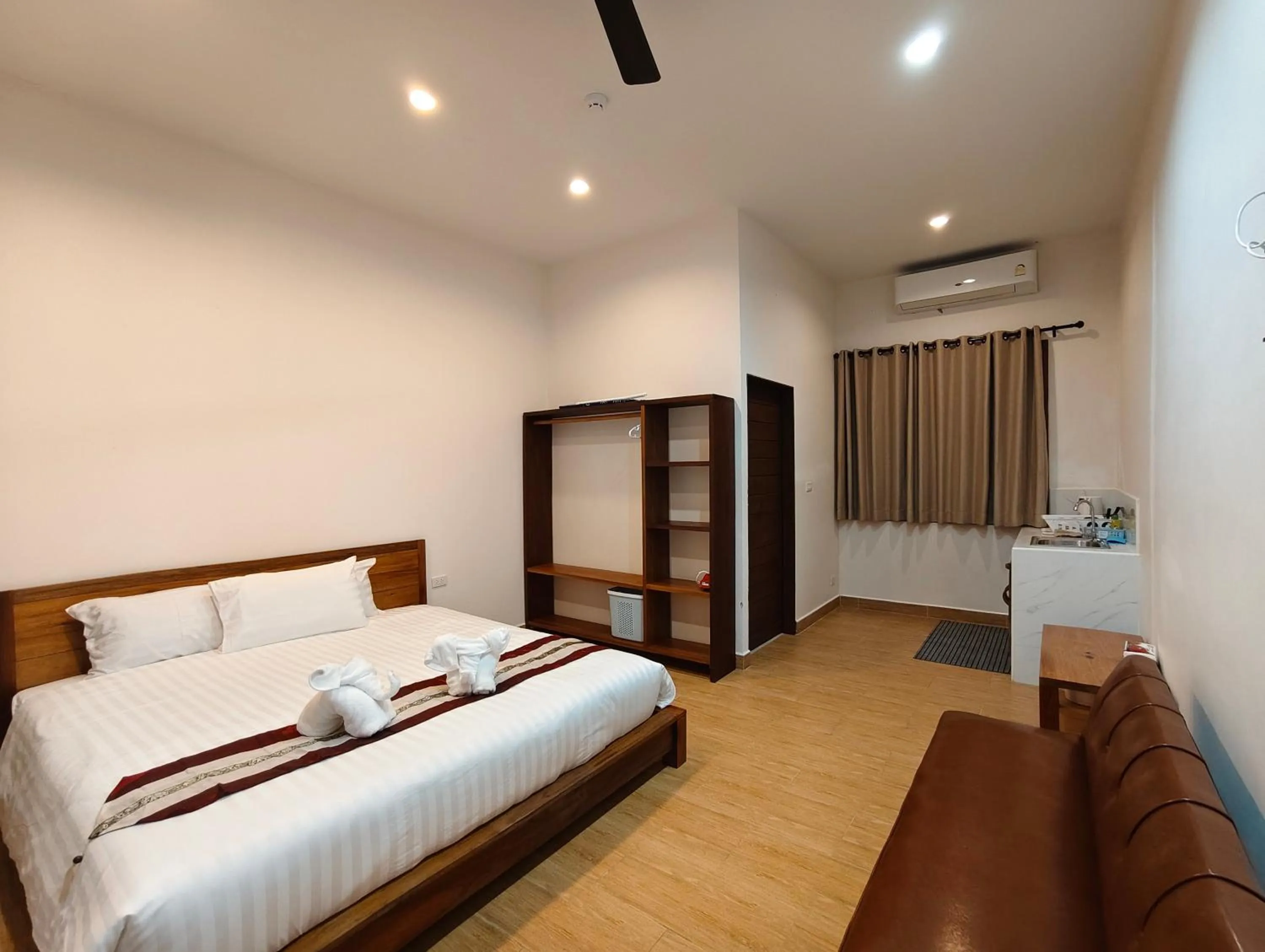 Bed in Le Grand Bleu Hotel