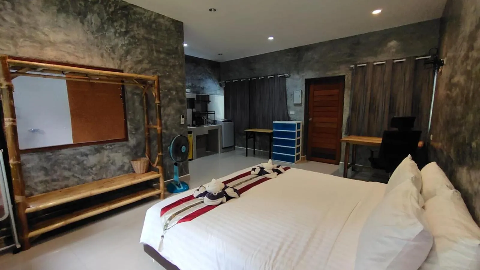 Bed in Le Grand Bleu Hotel