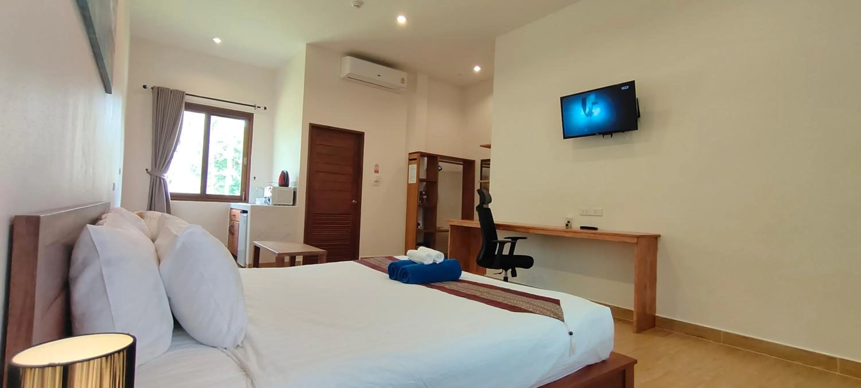 Bed in Le Grand Bleu Hotel