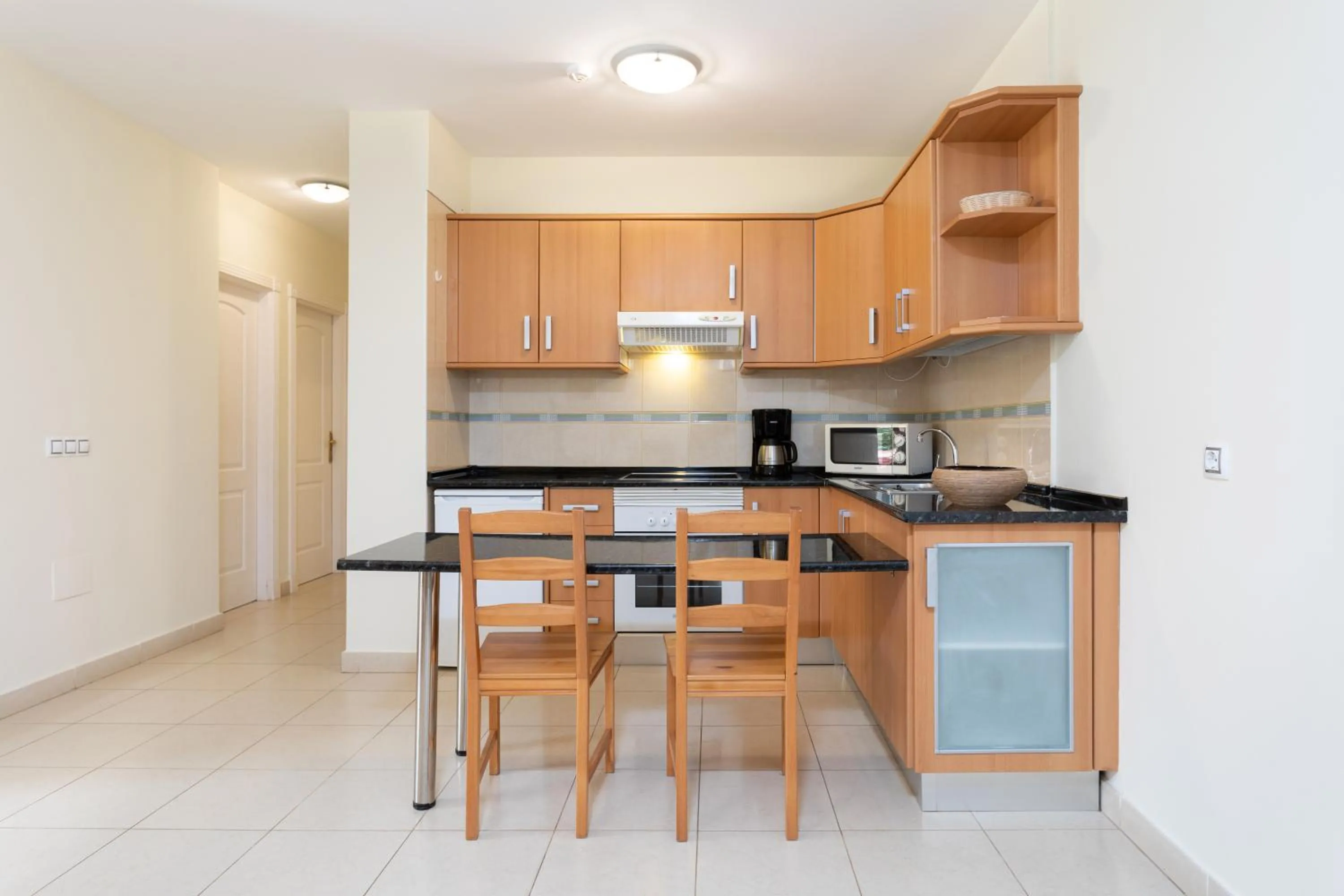 Kitchen or kitchenette in Residencial El Llano