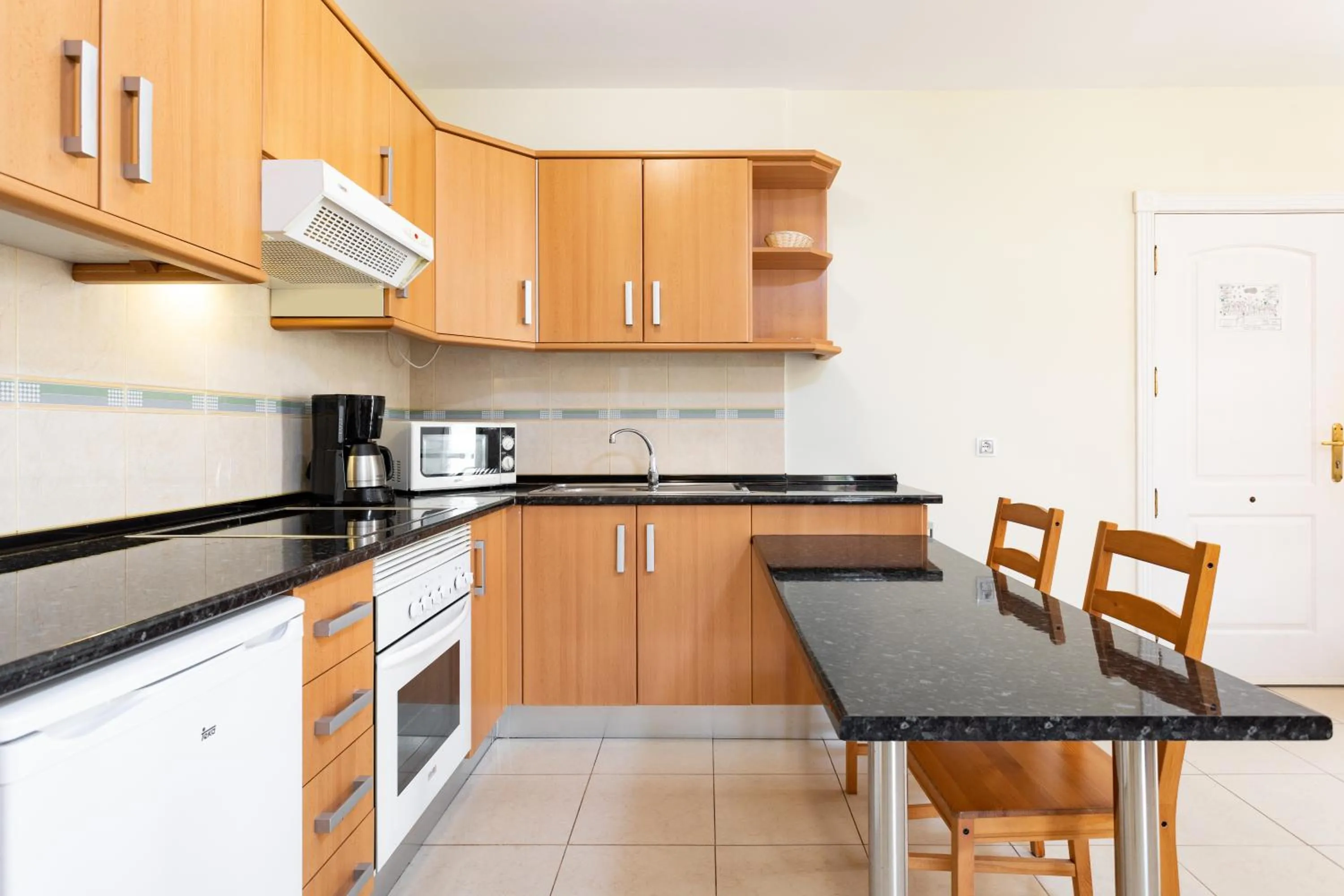 Kitchen or kitchenette in Residencial El Llano