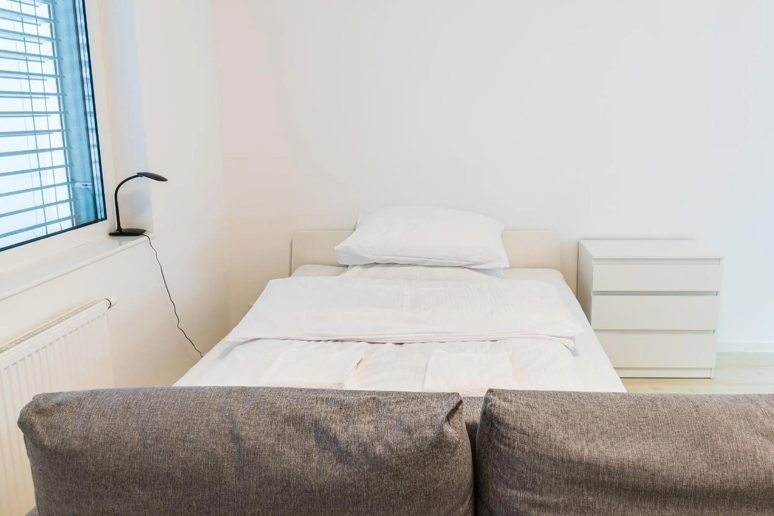 Bed in City Castle Apartments Free Parking