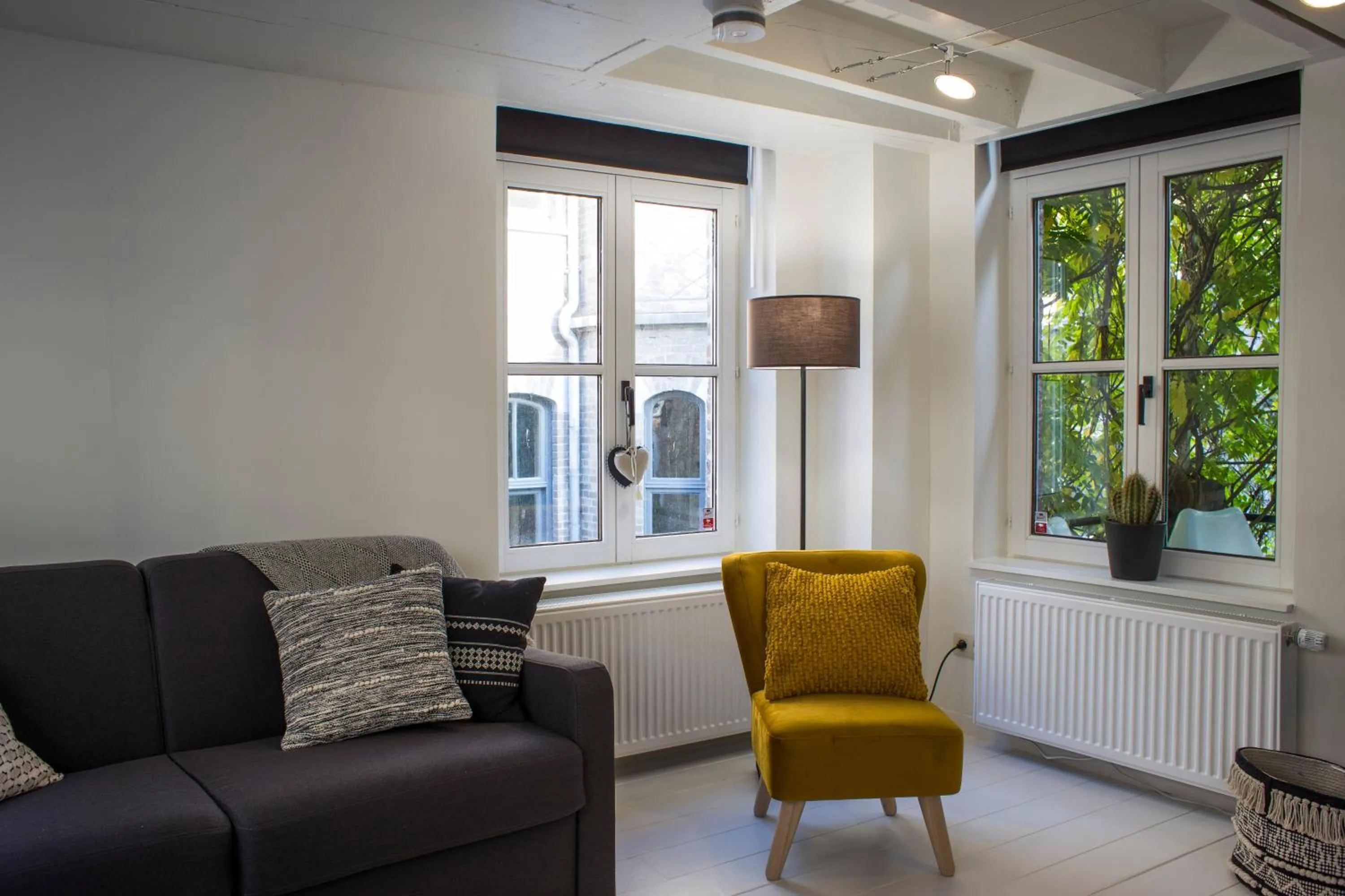 Living room in La Garçonnière de Wiertz - Esc'Appart