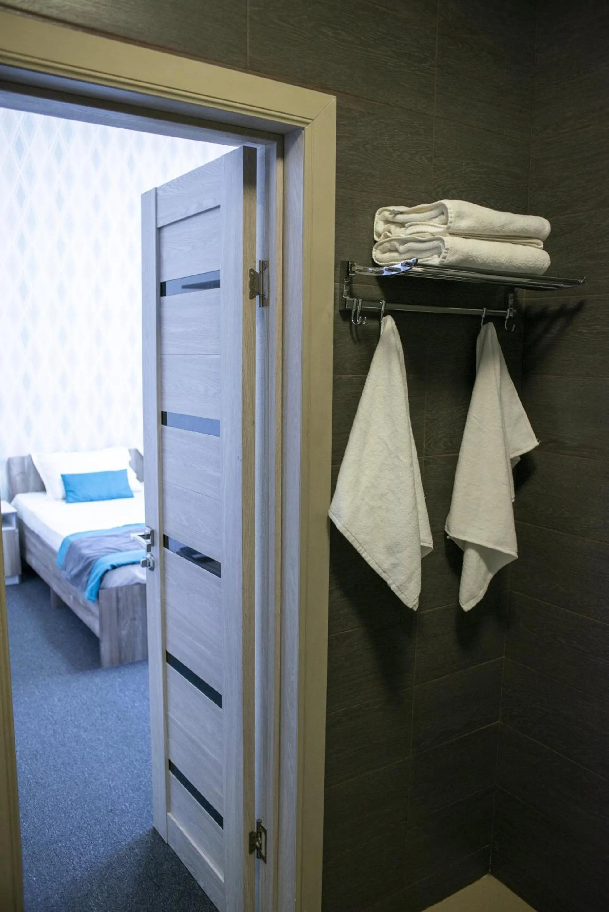 towels, Bed in Tarlan Hotel