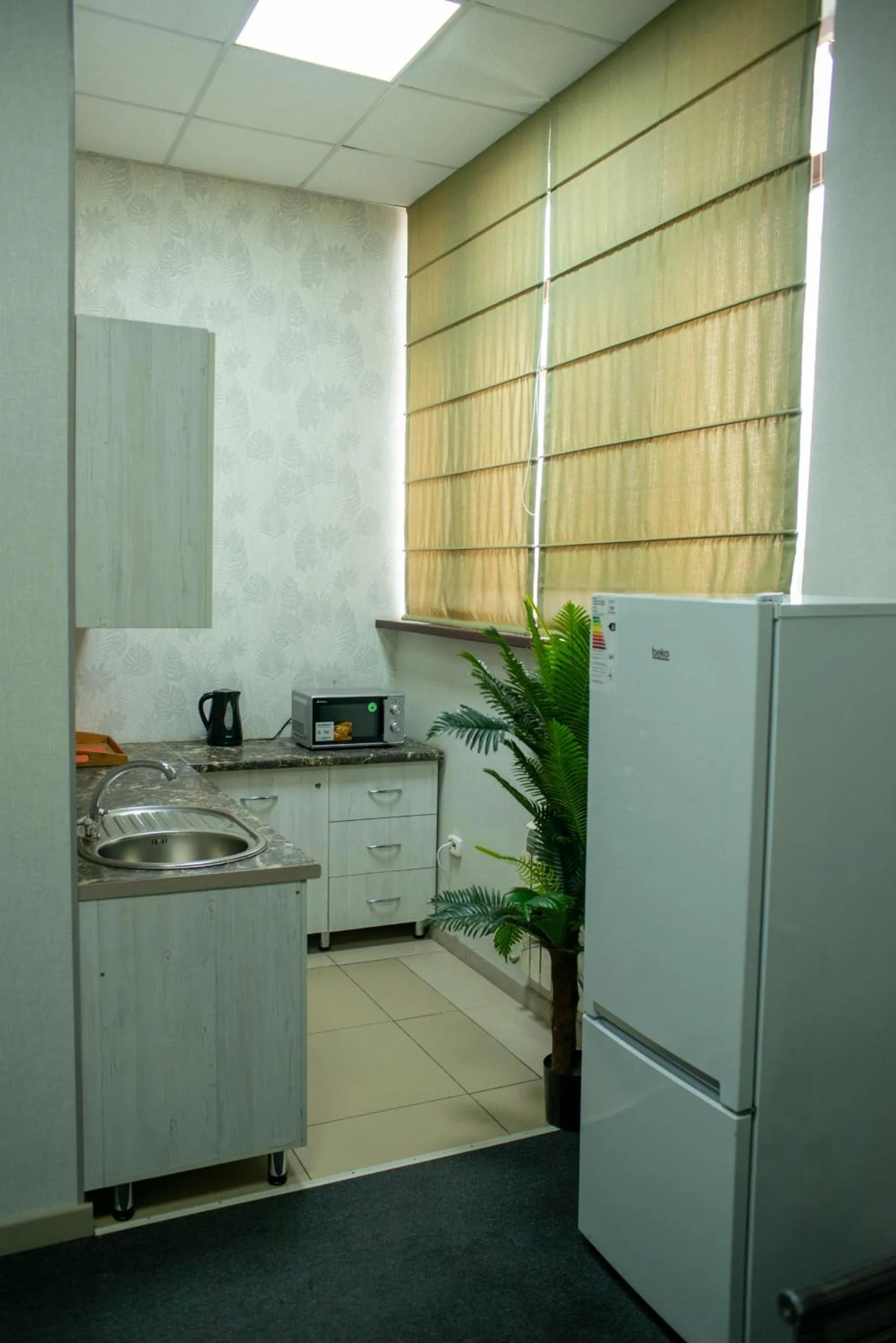 Communal kitchen in Tarlan Hotel