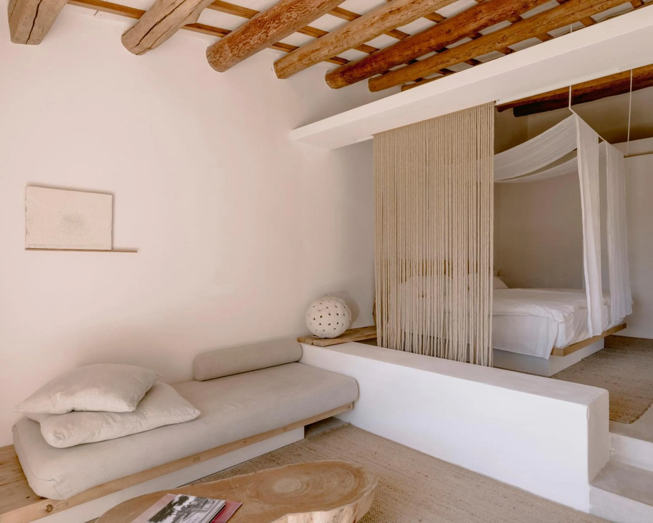 Living room, Bed in Es Raco d'Arta, Mallorca, a Member of Design Hotels