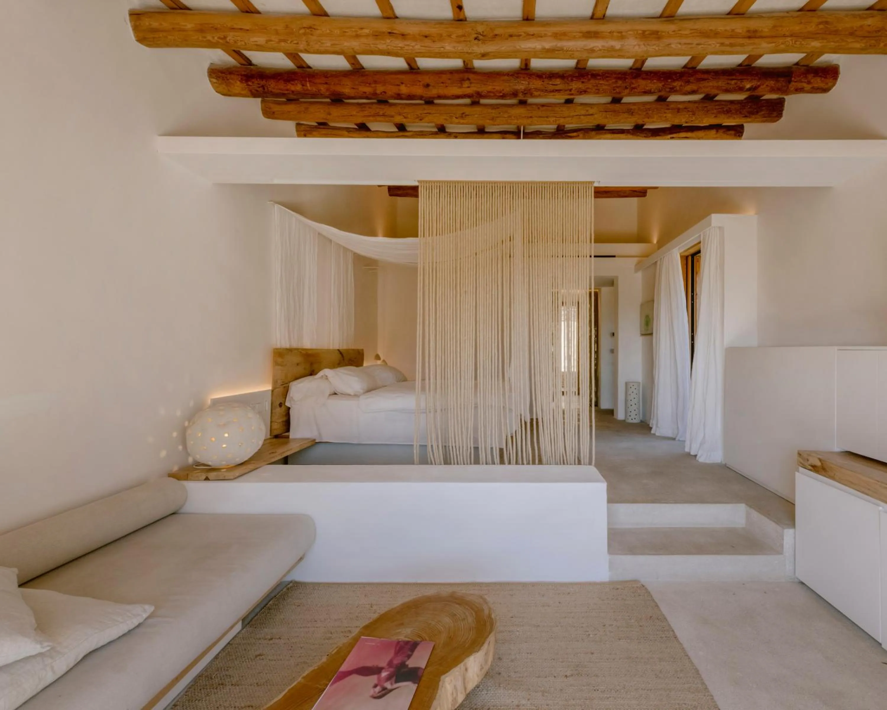 Living room, Bed in Es Raco d'Arta, Mallorca, a Member of Design Hotels