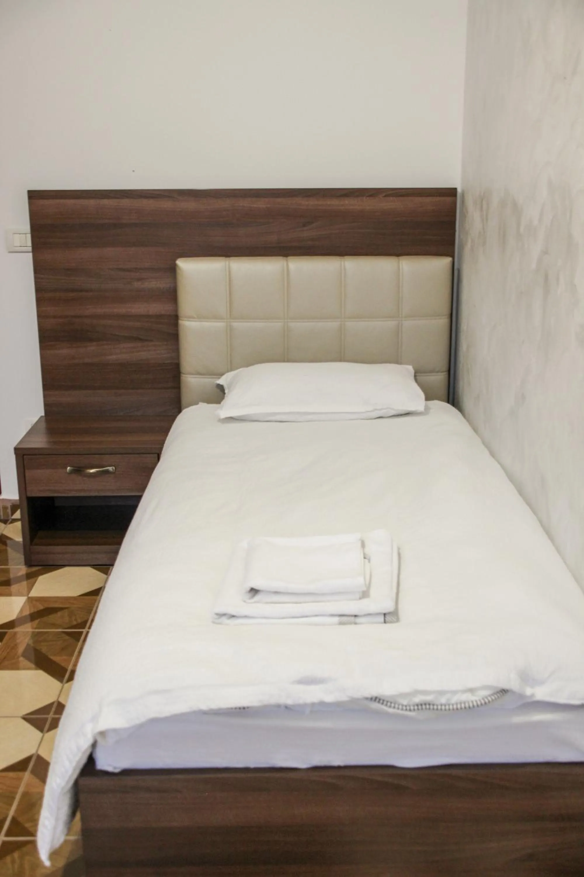 Bed in Hotel Corina