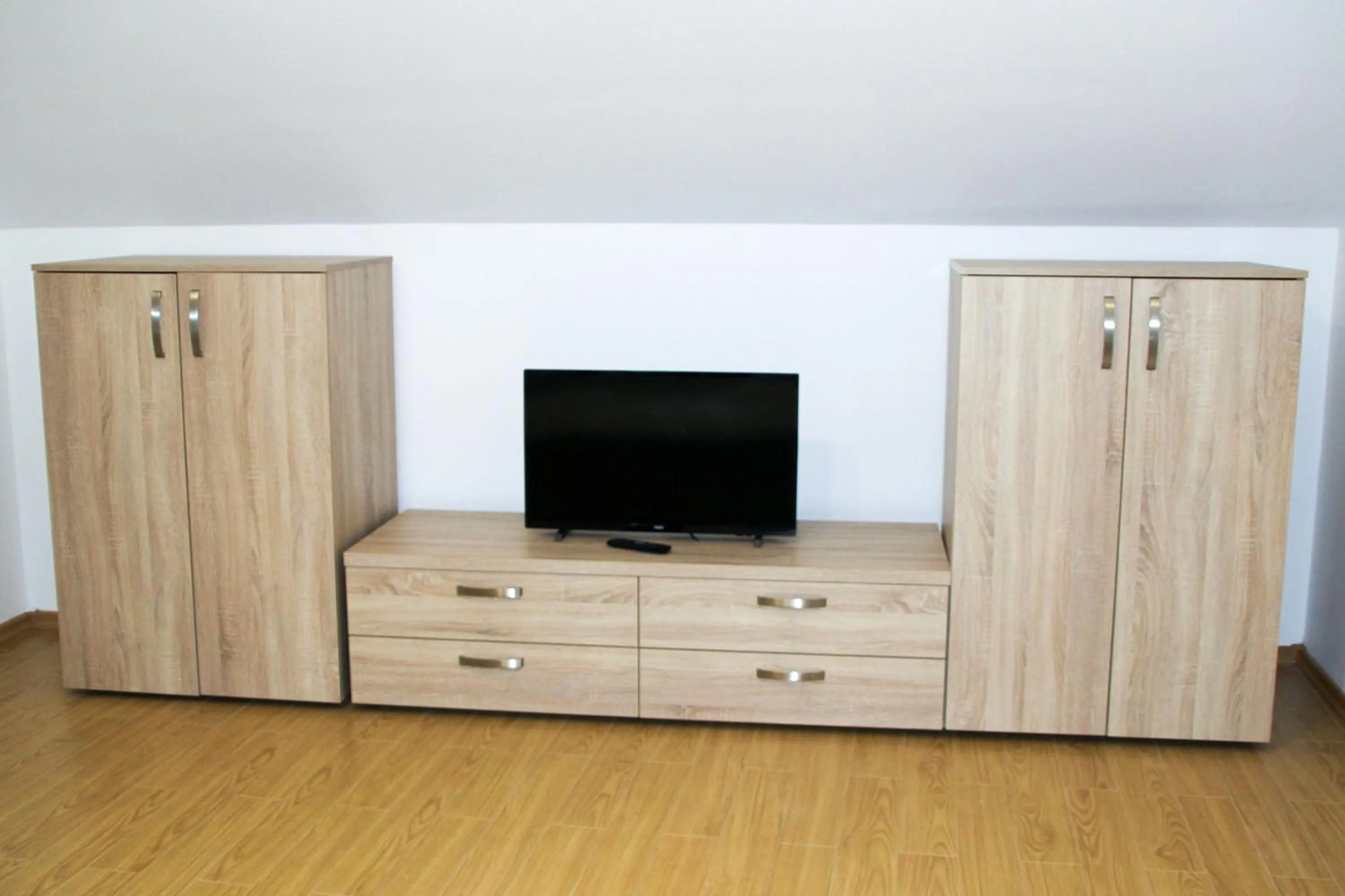 Communal lounge/ TV room in Hotel Corina