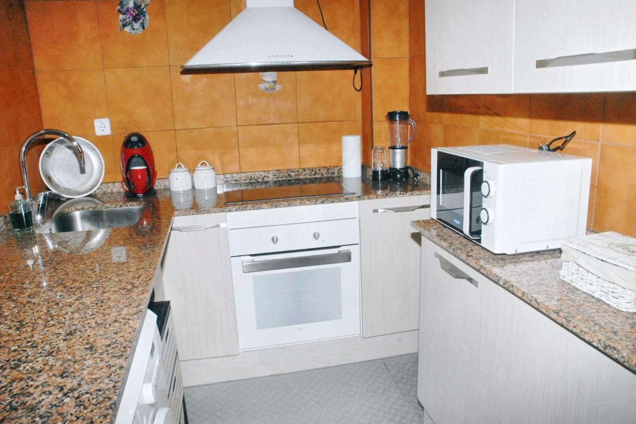 Kitchen or kitchenette in Bright Apartment in Sitges + Balcony