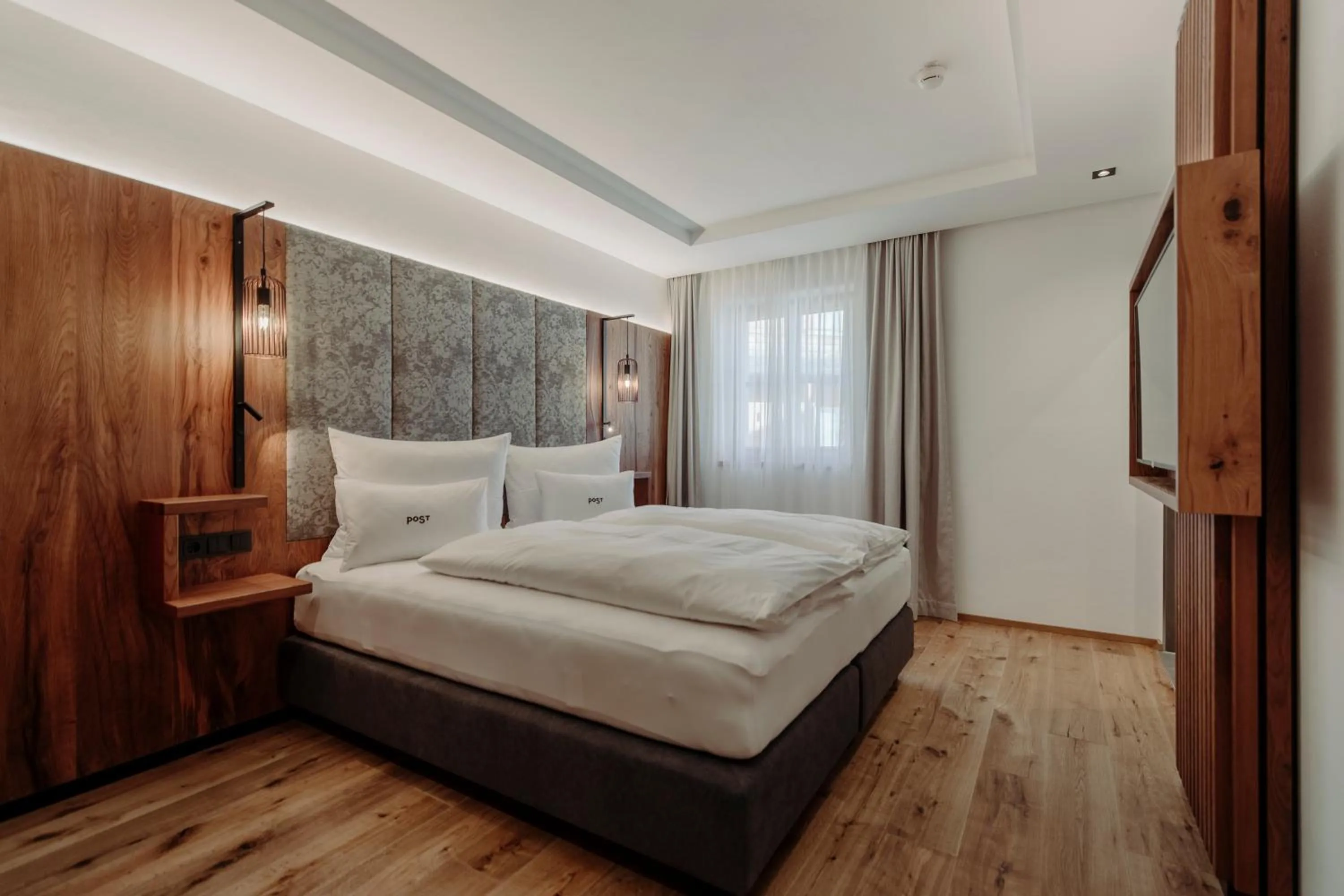 Bed in PoSt Boutique Apartments