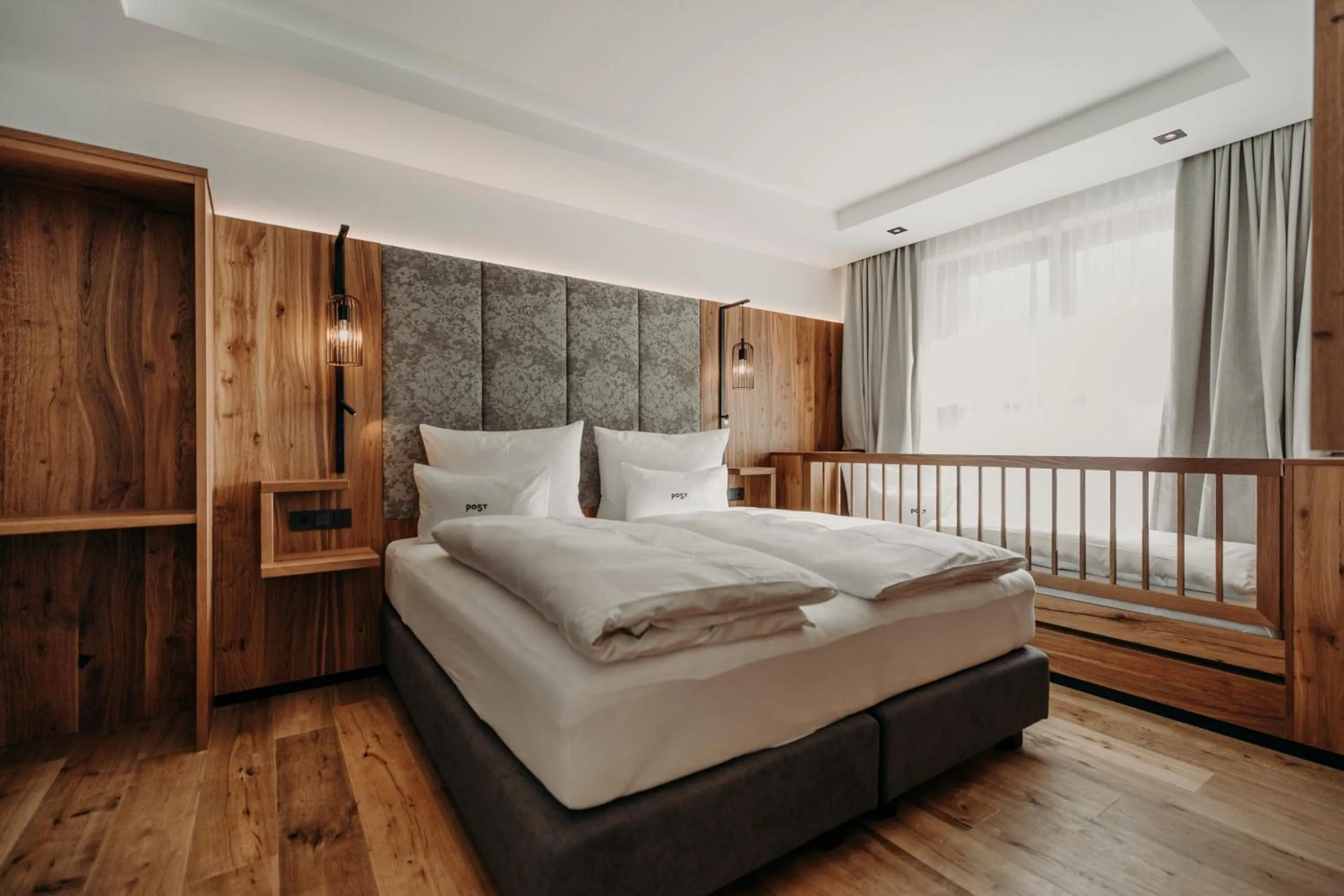 Bed in PoSt Boutique Apartments