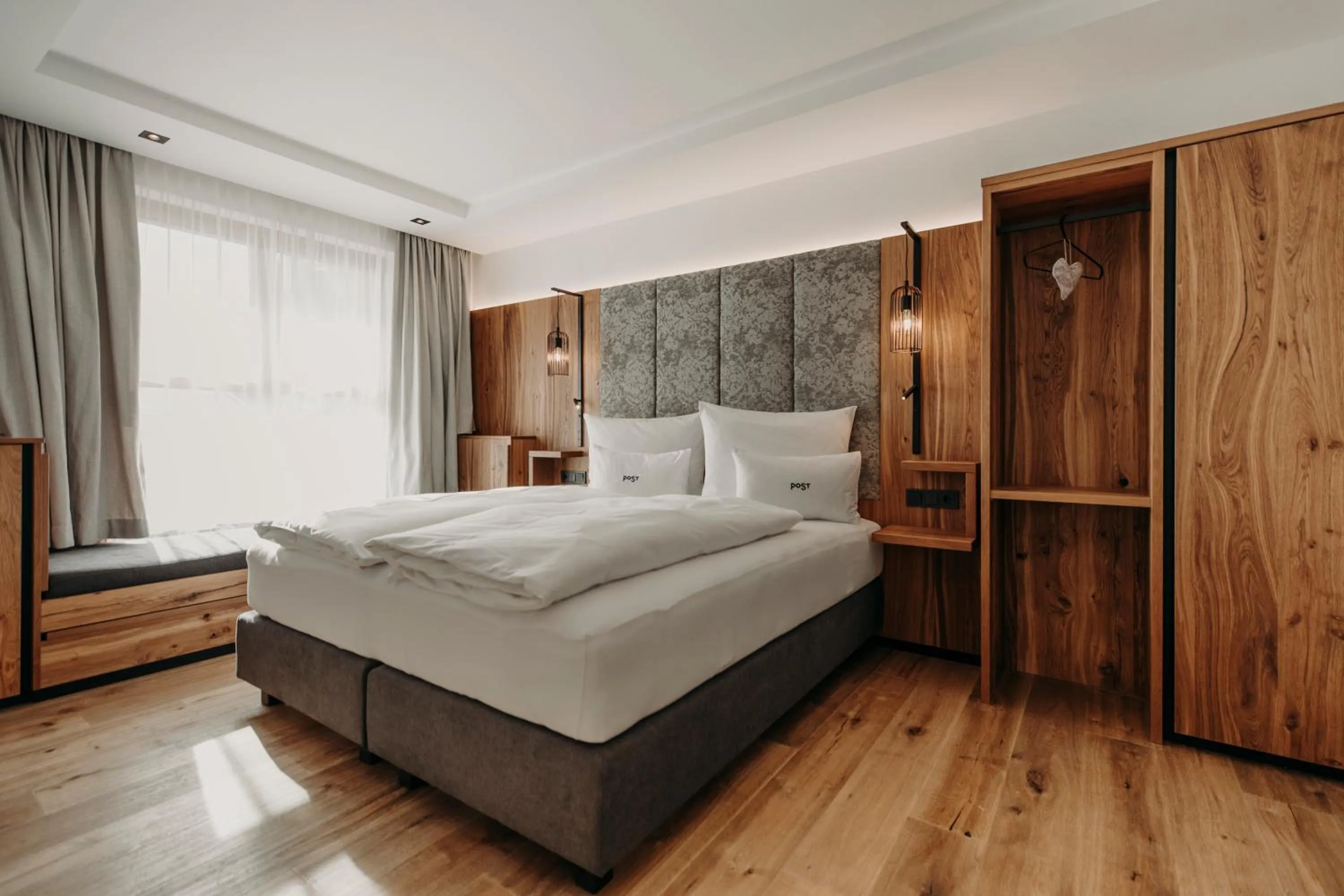 Bed in PoSt Boutique Apartments