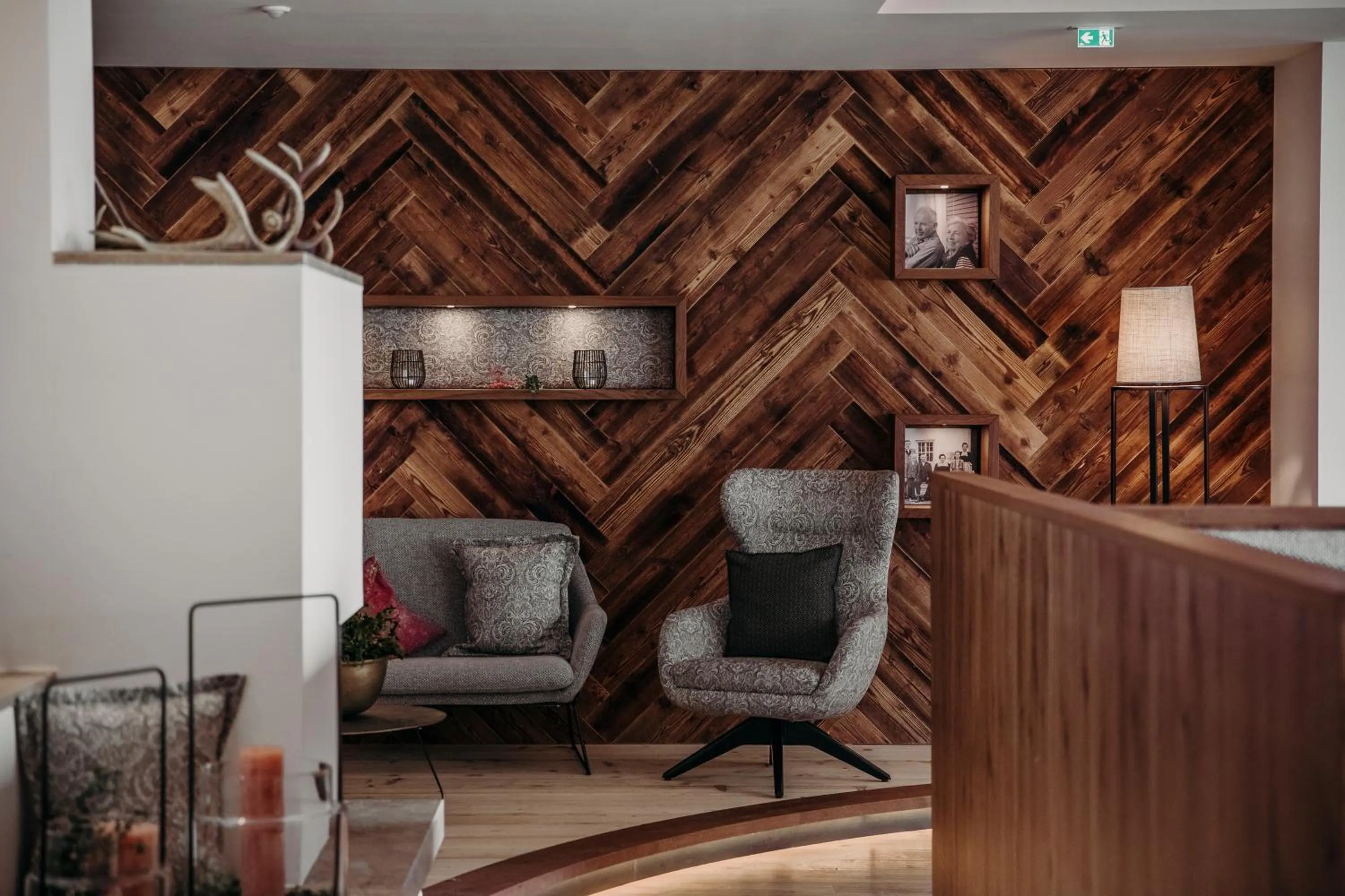 Communal lounge/ TV room in PoSt Boutique Apartments