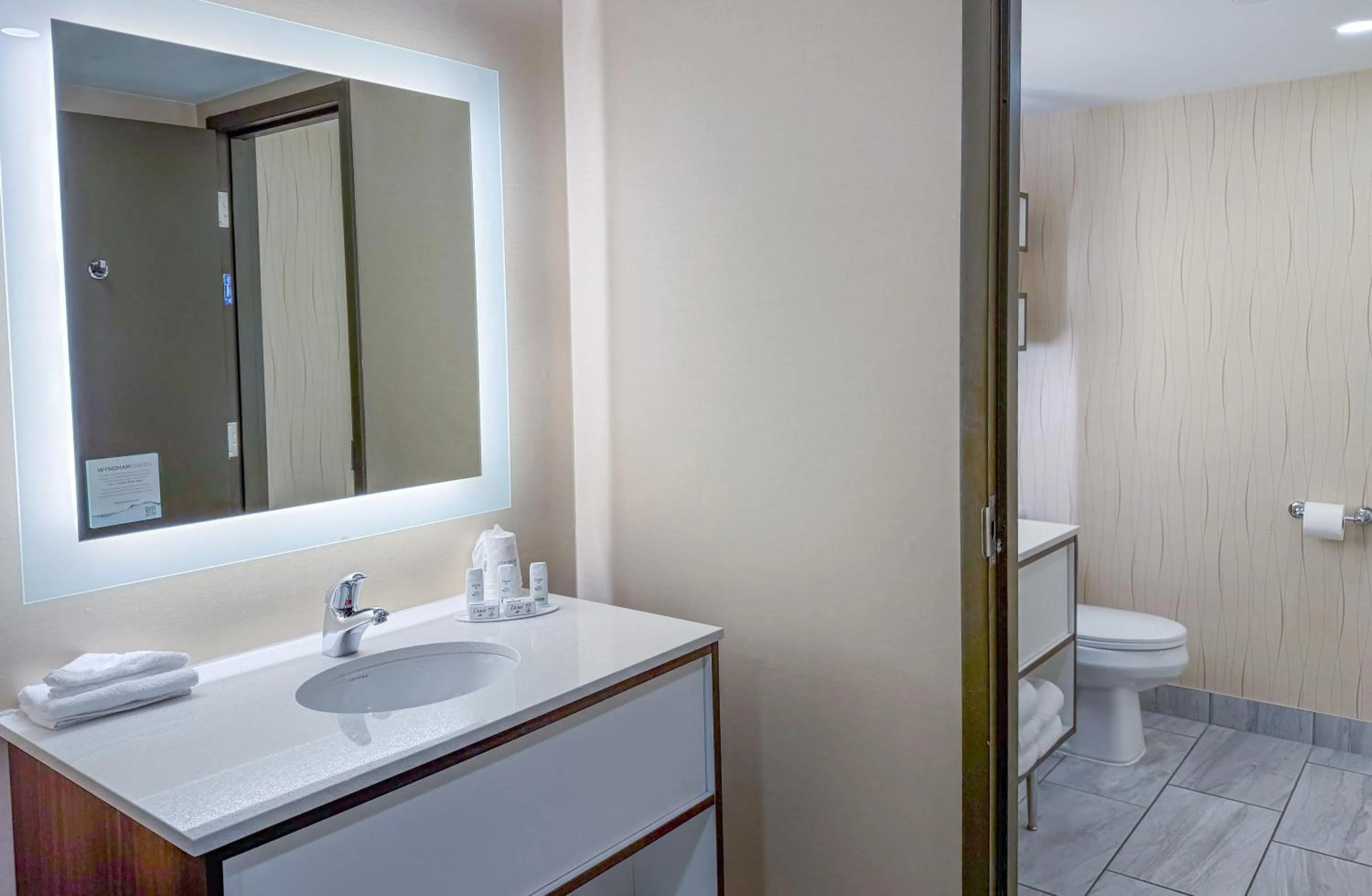 Bathroom in Howard Johnson Plaza by Wyndham by the Falls Niagara Falls