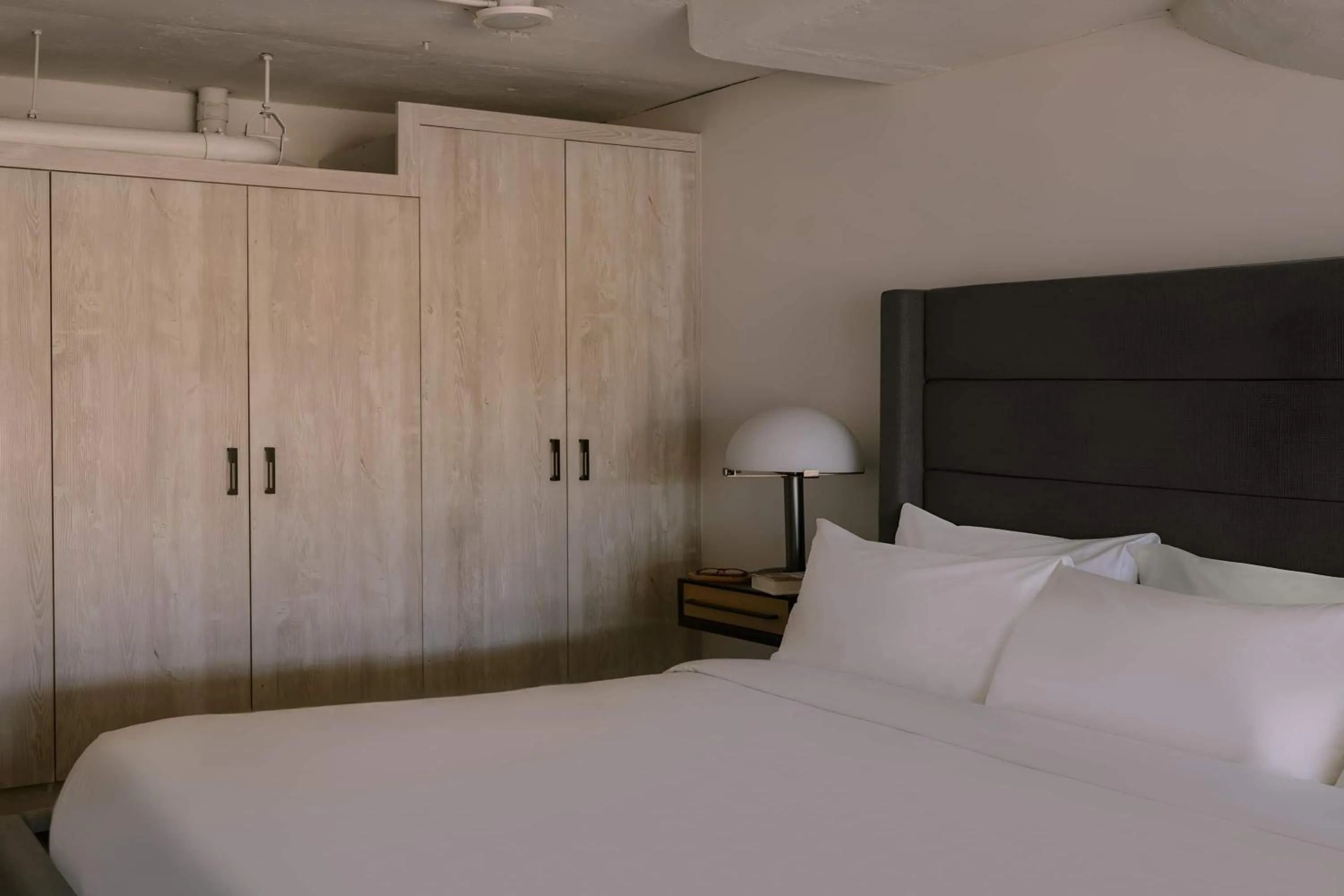 Photo of the whole room, Bed in The Heid Lofts by Reside, a Wyndham Residence