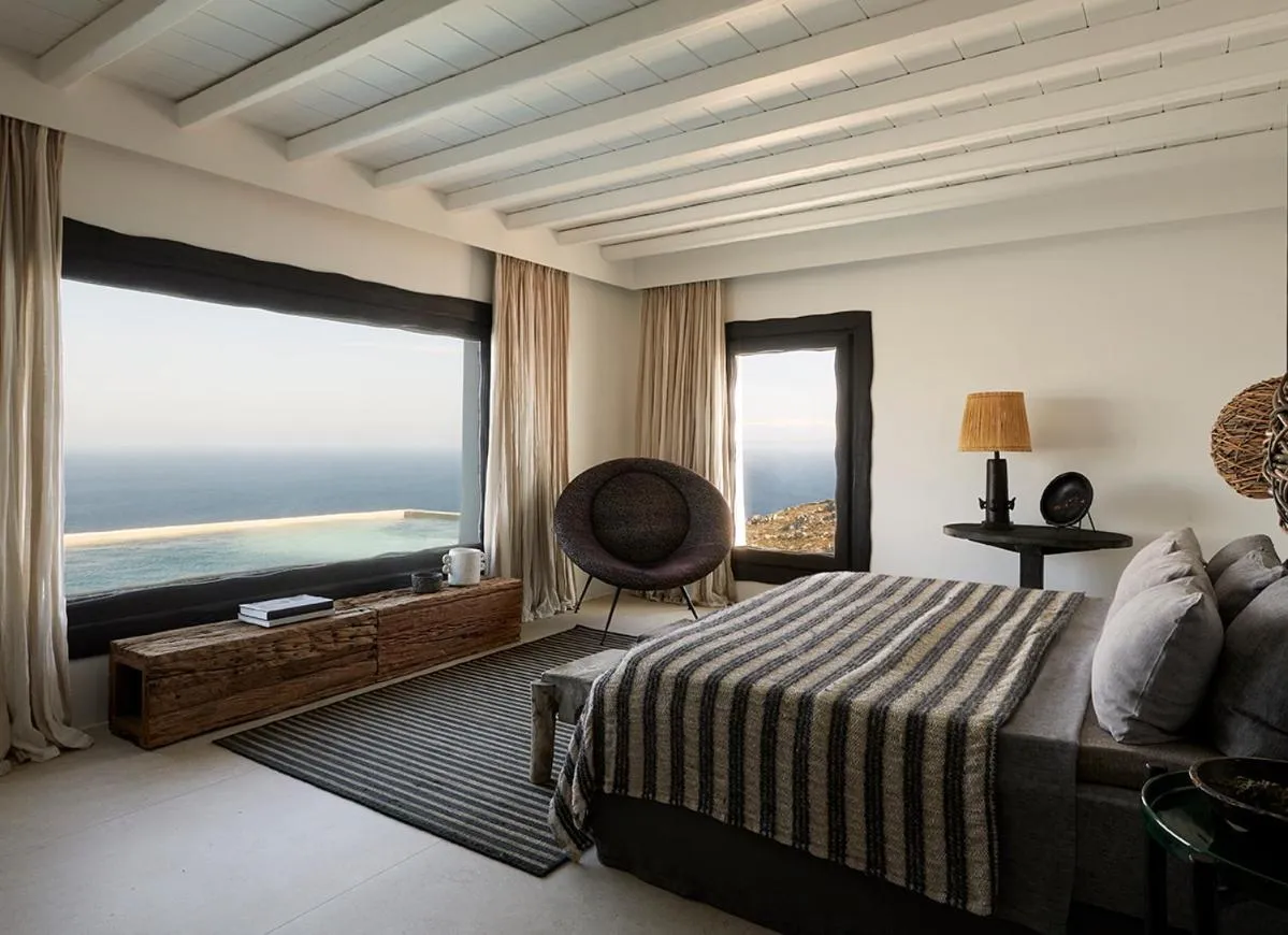 Bed in Myconian Panoptis Escape, a member of Small Luxury Hotels of the World