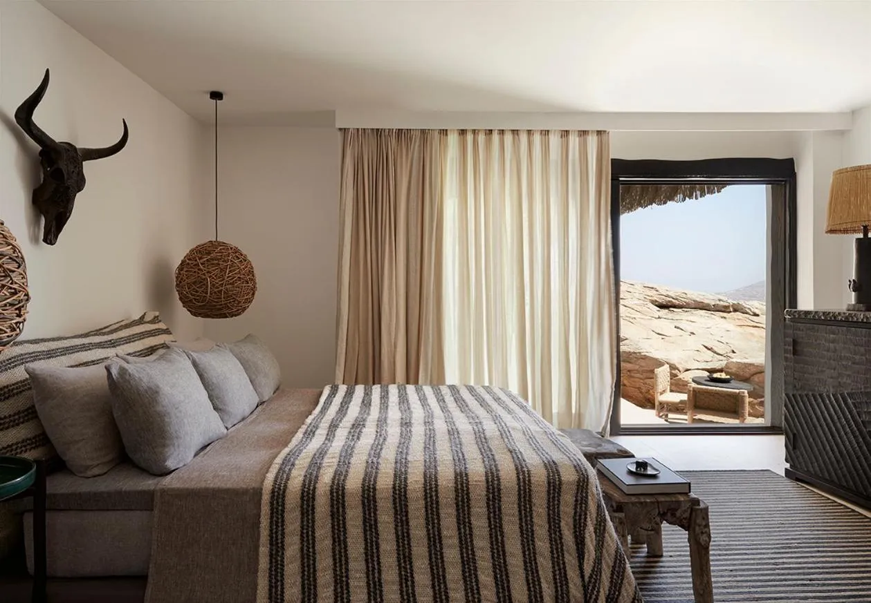 Bed in Myconian Panoptis Escape, a member of Small Luxury Hotels of the World