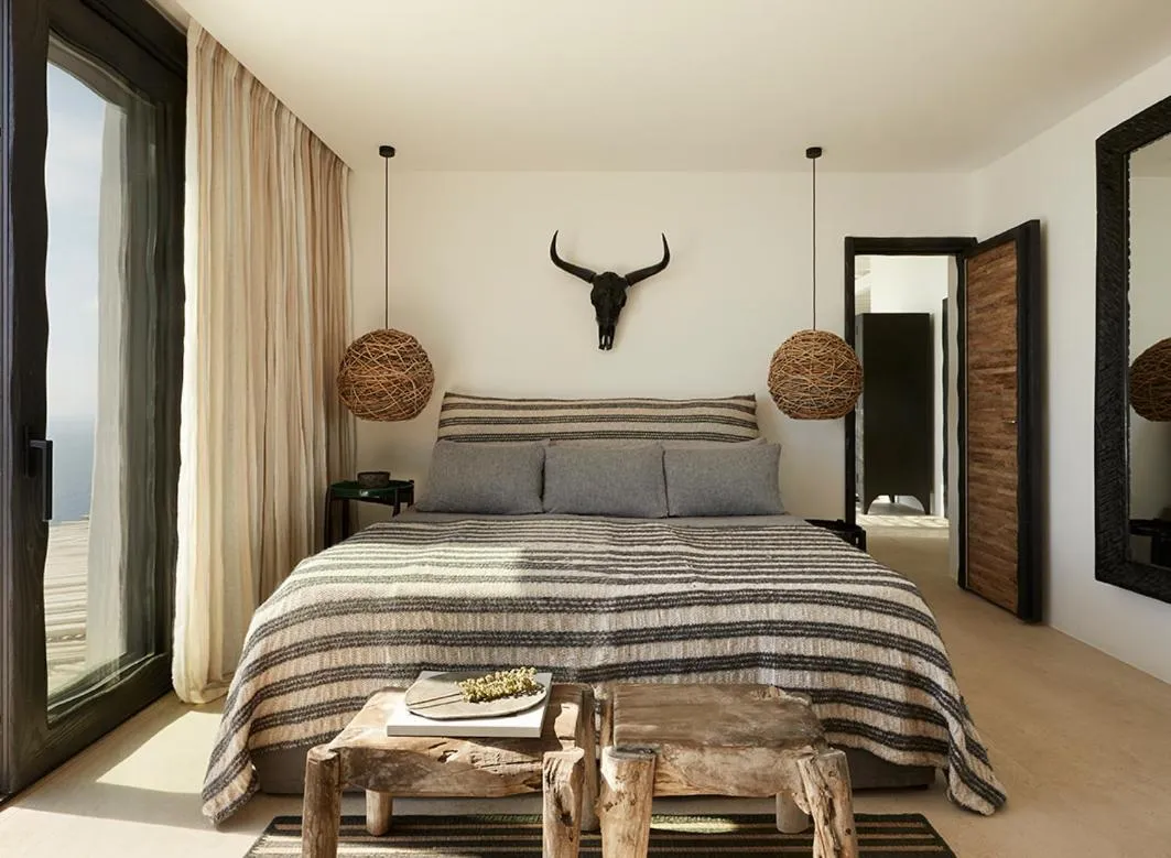 Bed in Myconian Panoptis Escape, a member of Small Luxury Hotels of the World