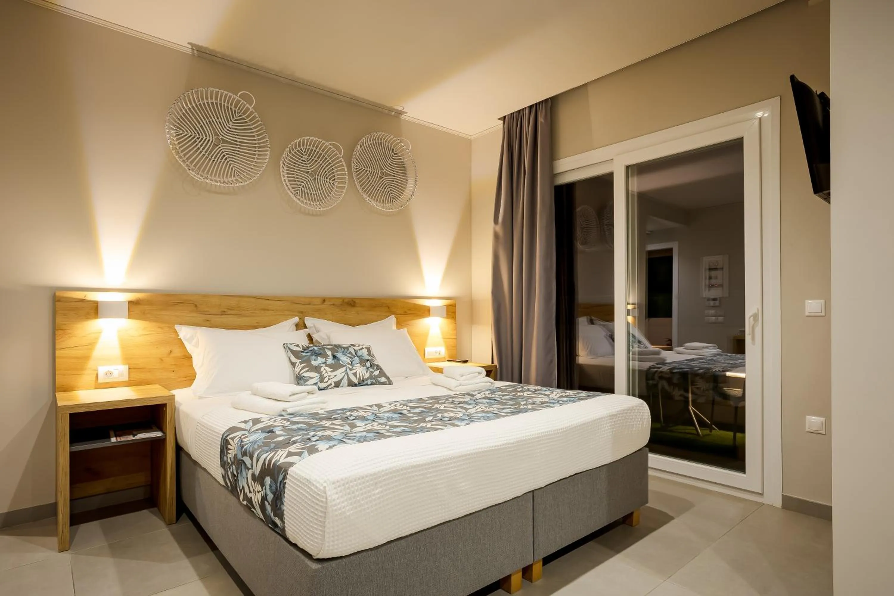 Bed in Sarpidon Suites