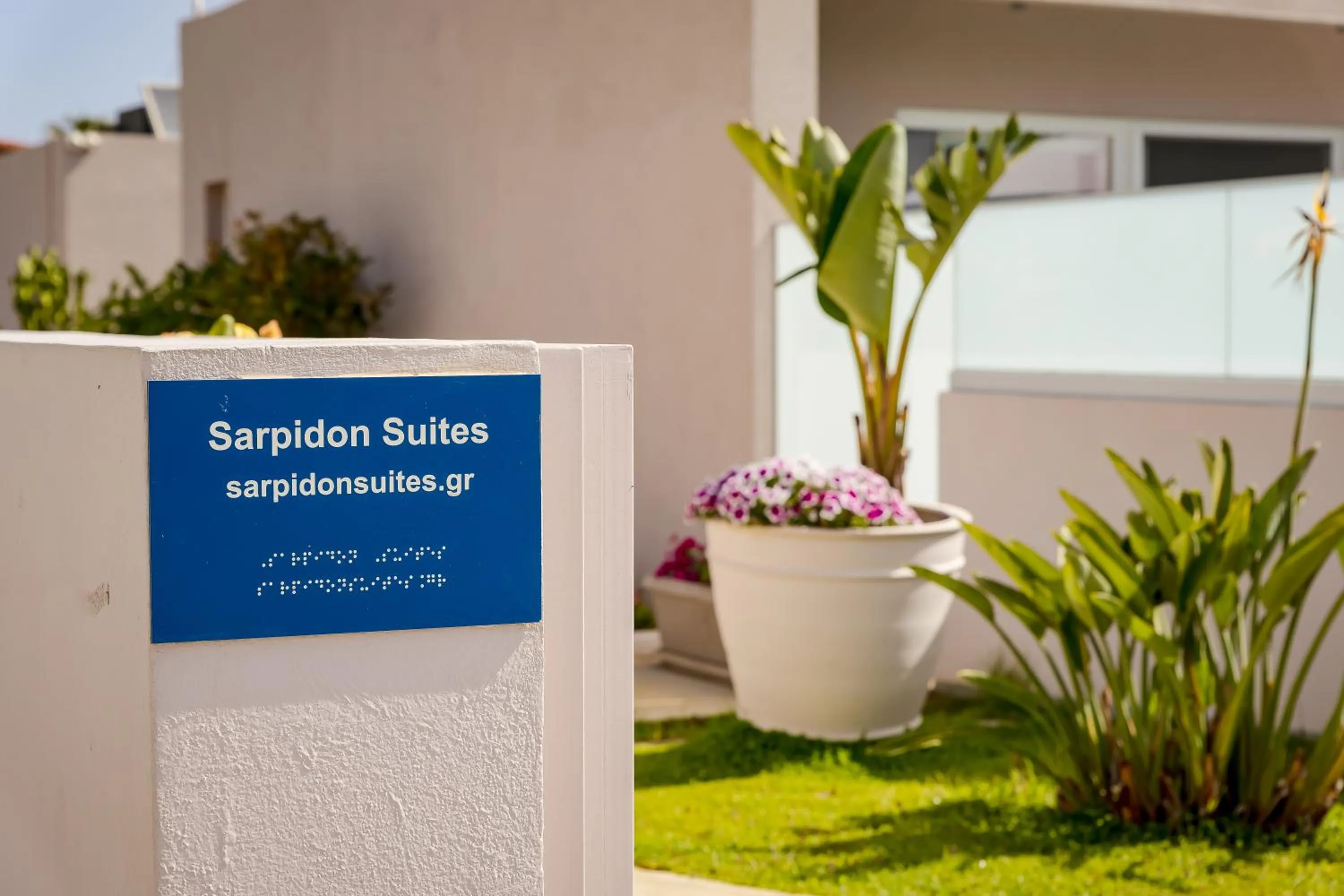 Property logo or sign in Sarpidon Suites